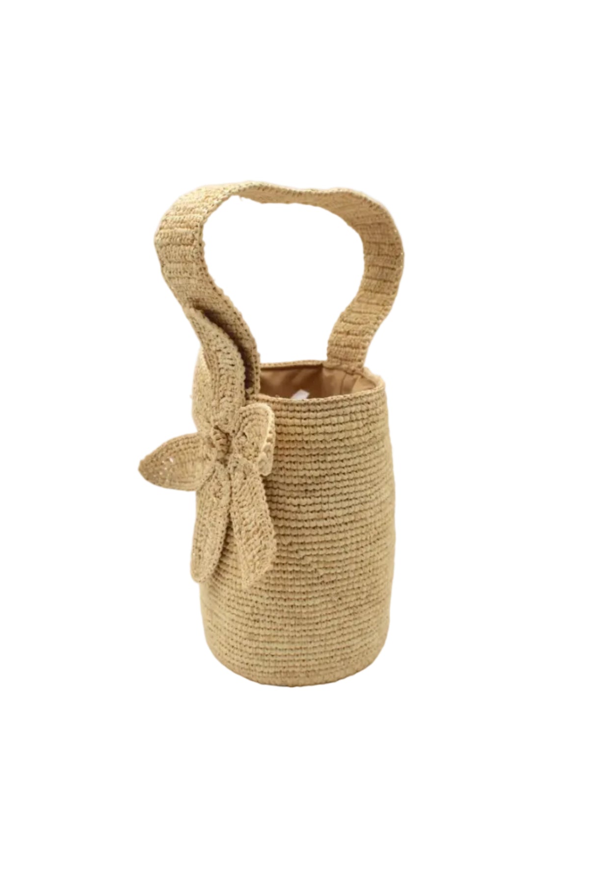 Side view Valencia Mini Crochet Petit Straw Basket Handbag with Flower Embellishment handmade natural raffia palm fiber in a solid hue of Natural straw color crochet in bands of horizontal link pattern texture with integrated strap handle and large flower embellishment - Shebobo