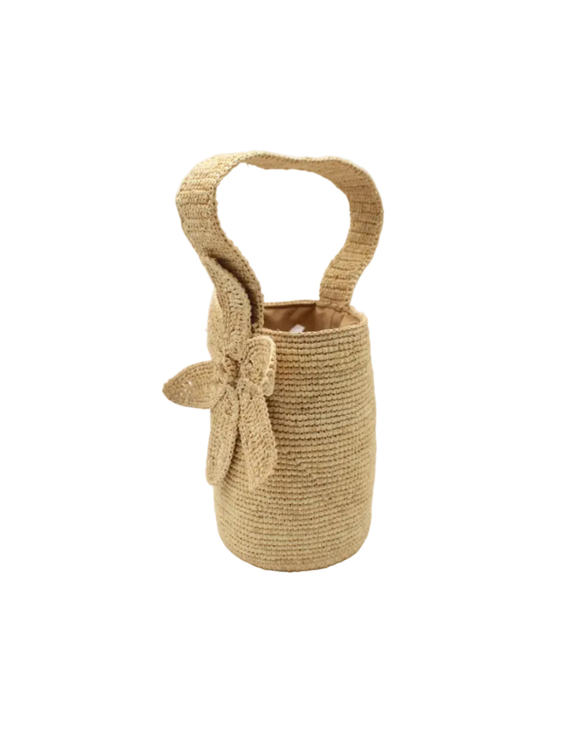 Side view Valencia Mini Crochet Petit Straw Basket Handbag with Flower Embellishment handmade natural raffia palm fiber in a solid hue of Natural straw color crochet in bands of horizontal link pattern texture with integrated strap handle and large flower embellishment - Shebobo