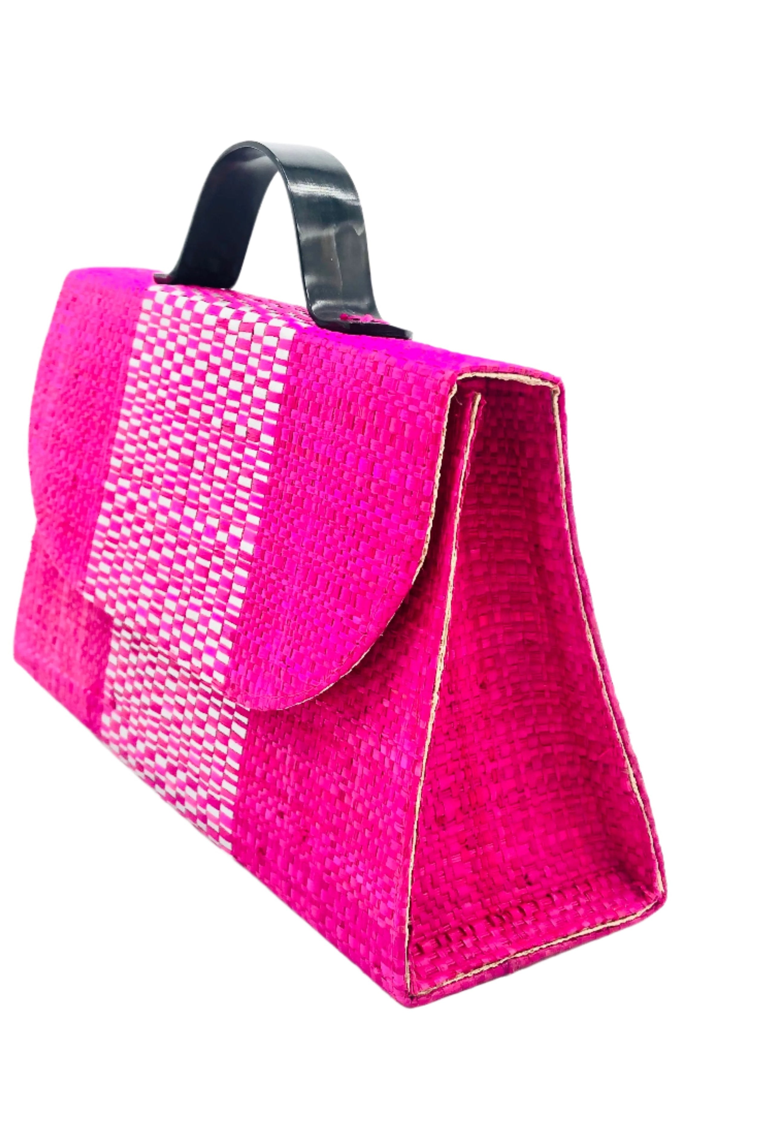 Side view Wynwood Fuchsia Straw Handbag with Metallic Detailing & Horn Handle handmade loomed raffia in fuchsia pink and silver metallic vegan leather in three vertical bands of color with the metallic weave centered on the purse under the handles - Shebobo