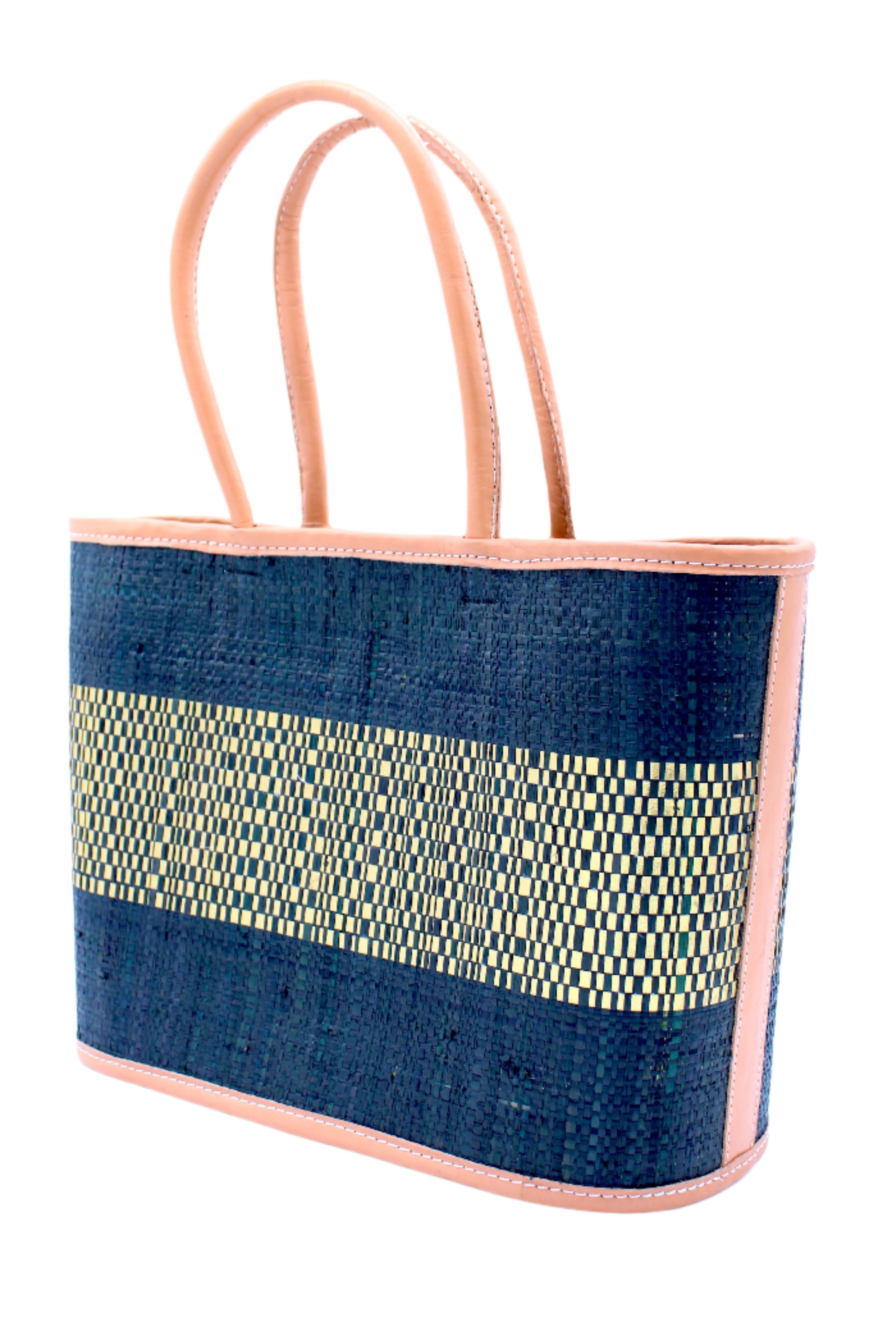 Side View Wynwood Black Straw Basket Bag Handbag with Metallic Detailing handmade loomed raffia in black and silver metallic vegan leather in three evenly sized horizontal bands of color with the metallic weave centered on the purse with leather binding and handles - Shebobo