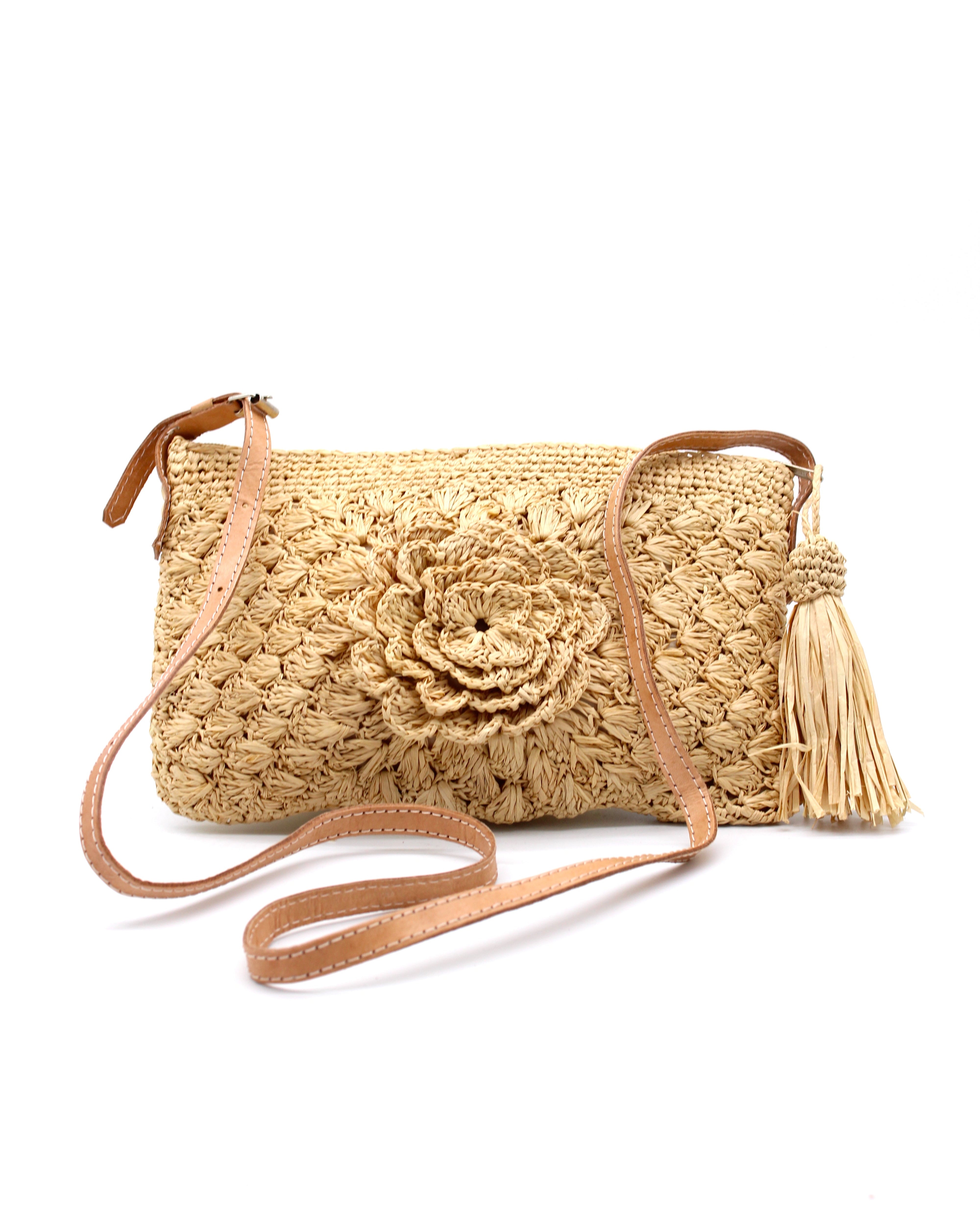 ZaZa Flower Hand Crochet Natural Raffia Palm Fiber Crossbody Bag with adjustable leather strap, zipper closure, and tassel zipper pull in natural straw color textured purse straw handbag - Shebobo