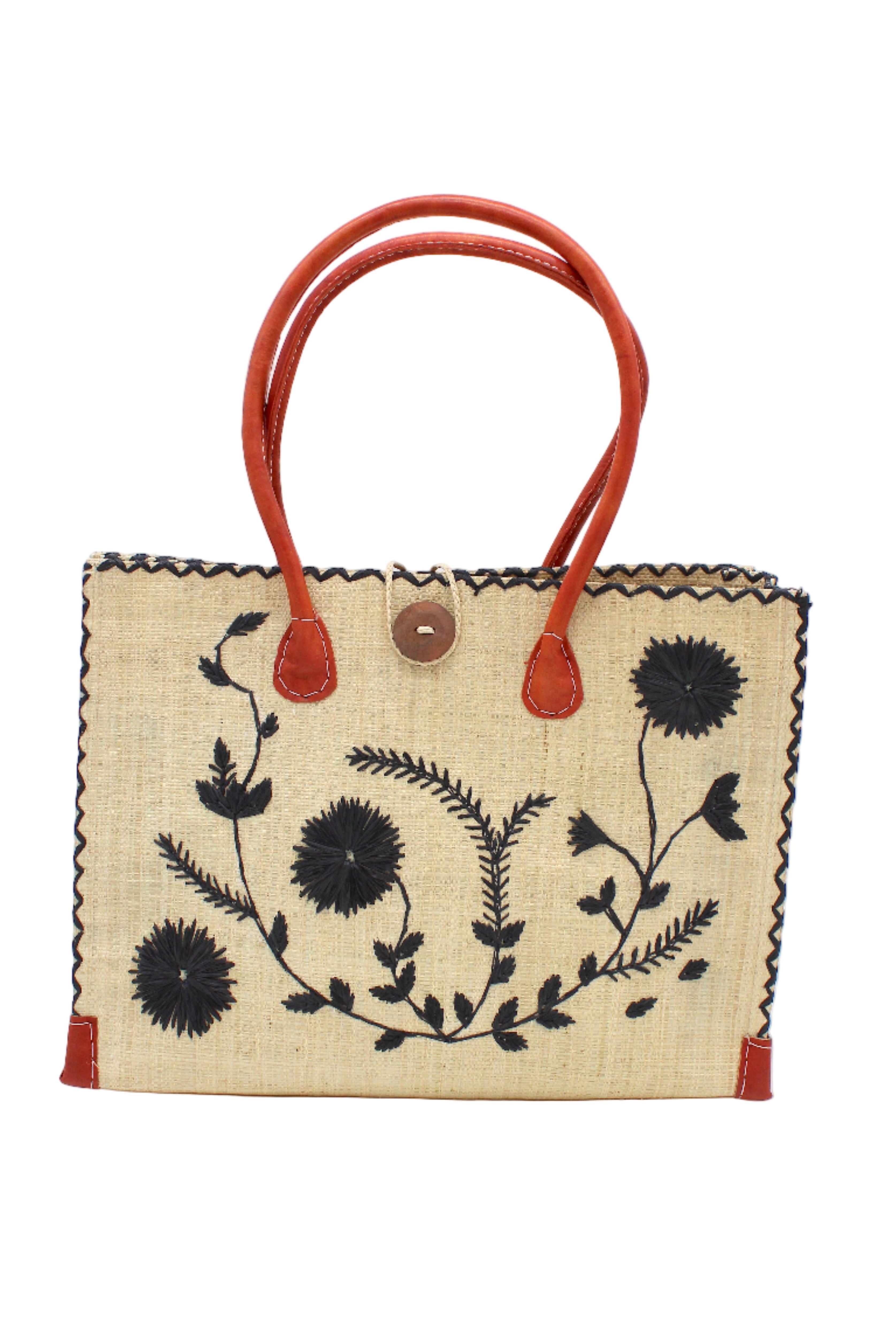 Zafran Natural & Black Embroidered Straw Beach Bag with Floral Pattern handmade natural raffia palm fiber in a solid hue of natural straw color with asymmetrical floral leaf, vine, and flower pattern in black with matching cross-stitch edging, leather handles, and wooden button closure shoulder bag handbag tote - Shebobo