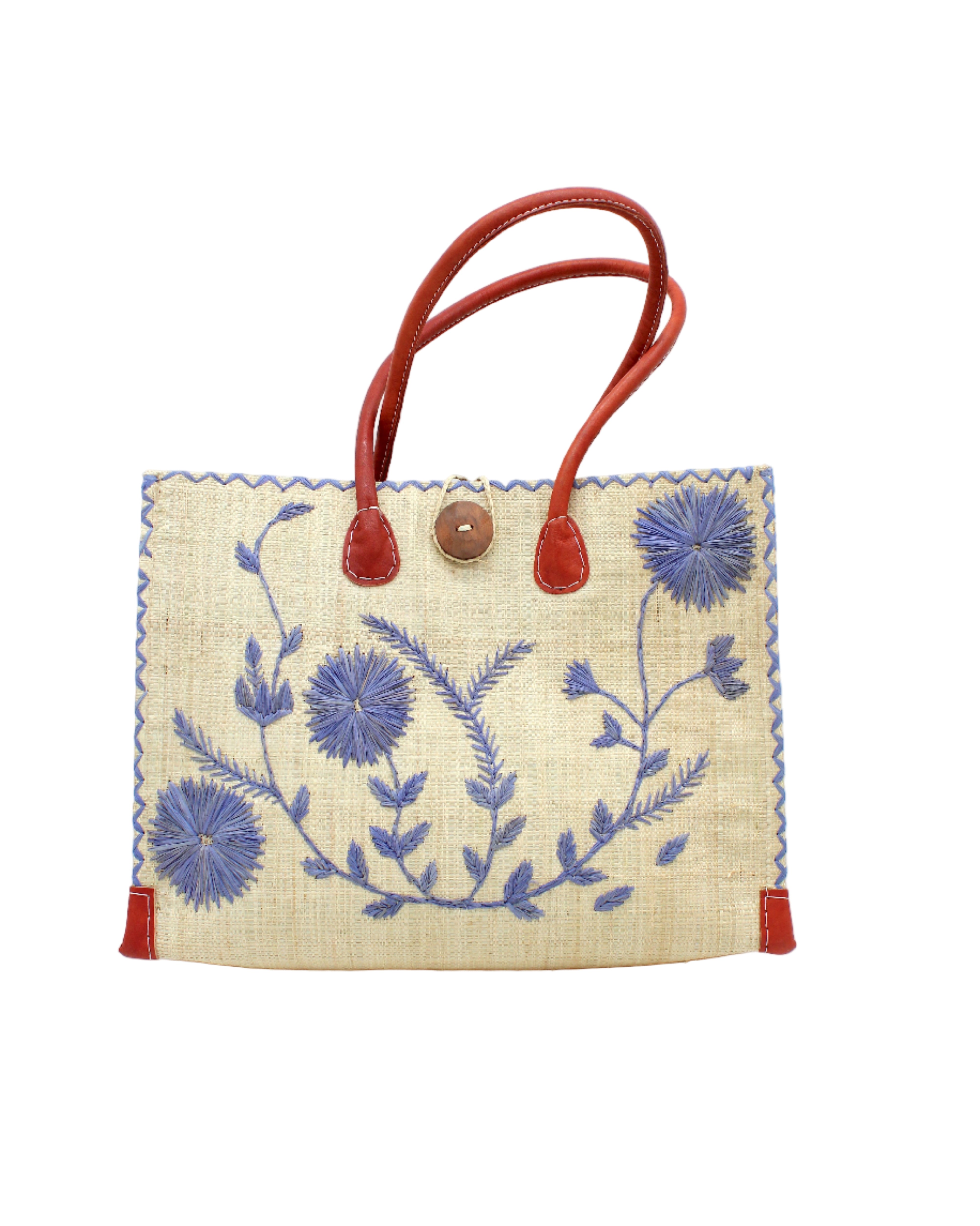 Zafran Natural & Denim Embroidered Straw Beach Bag with Floral Pattern handmade natural raffia palm fiber in a solid hue of natural straw color with asymmetrical floral leaf, vine, and flower pattern in denim retro/light/blue with matching cross-stitch edging, leather handles, and wooden button closure shoulder bag handbag tote - Shebobo
