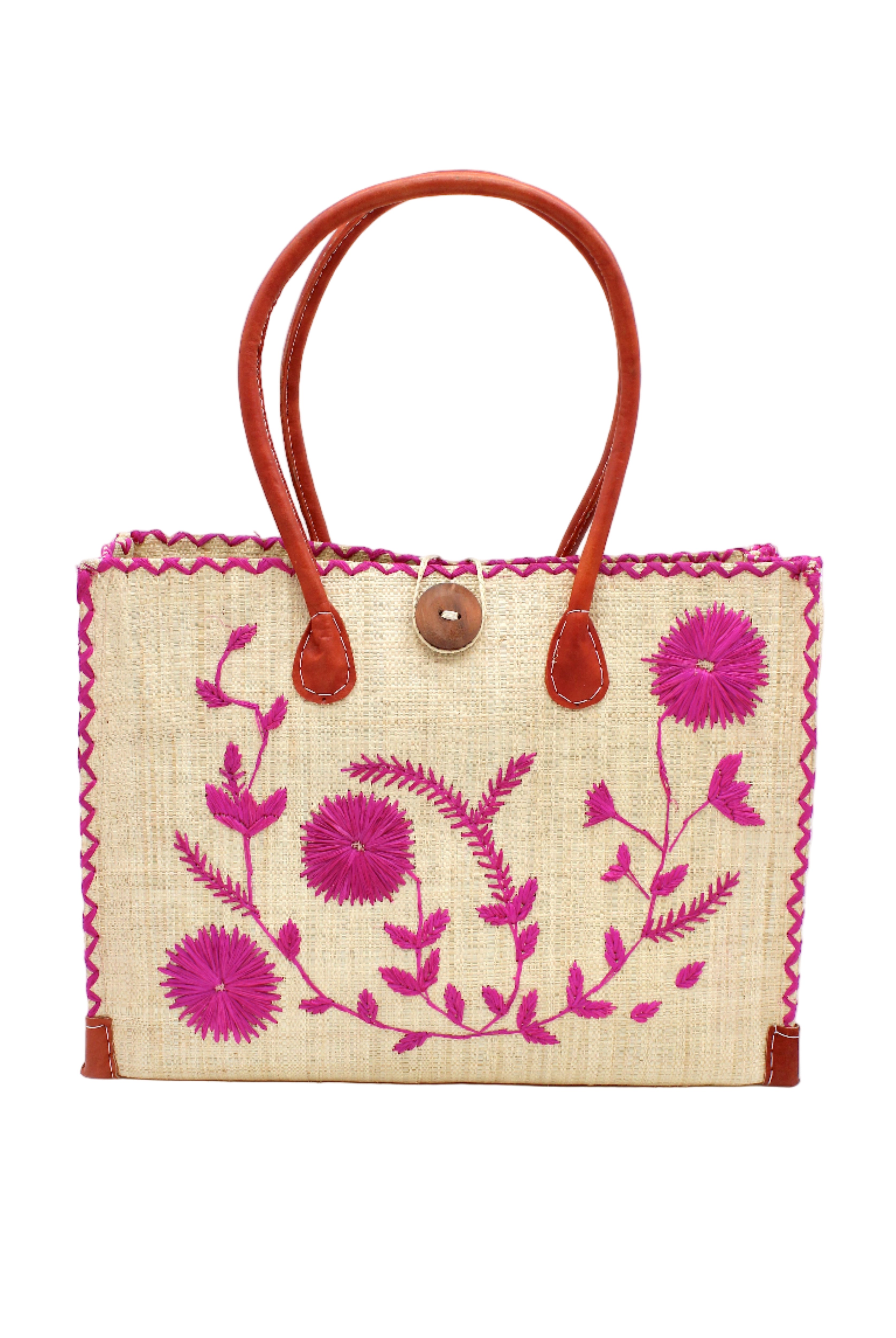 Zafran Natural & Fuchsia Embroidered Straw Beach Bag with Floral Pattern handmade natural raffia palm fiber in a solid hue of natural straw color with asymmetrical floral leaf, vine, and flower pattern in fuchsia hot/bright/barbie/pink with matching cross-stitch edging, leather handles, and wooden button closure shoulder bag handbag tote - Shebobo
