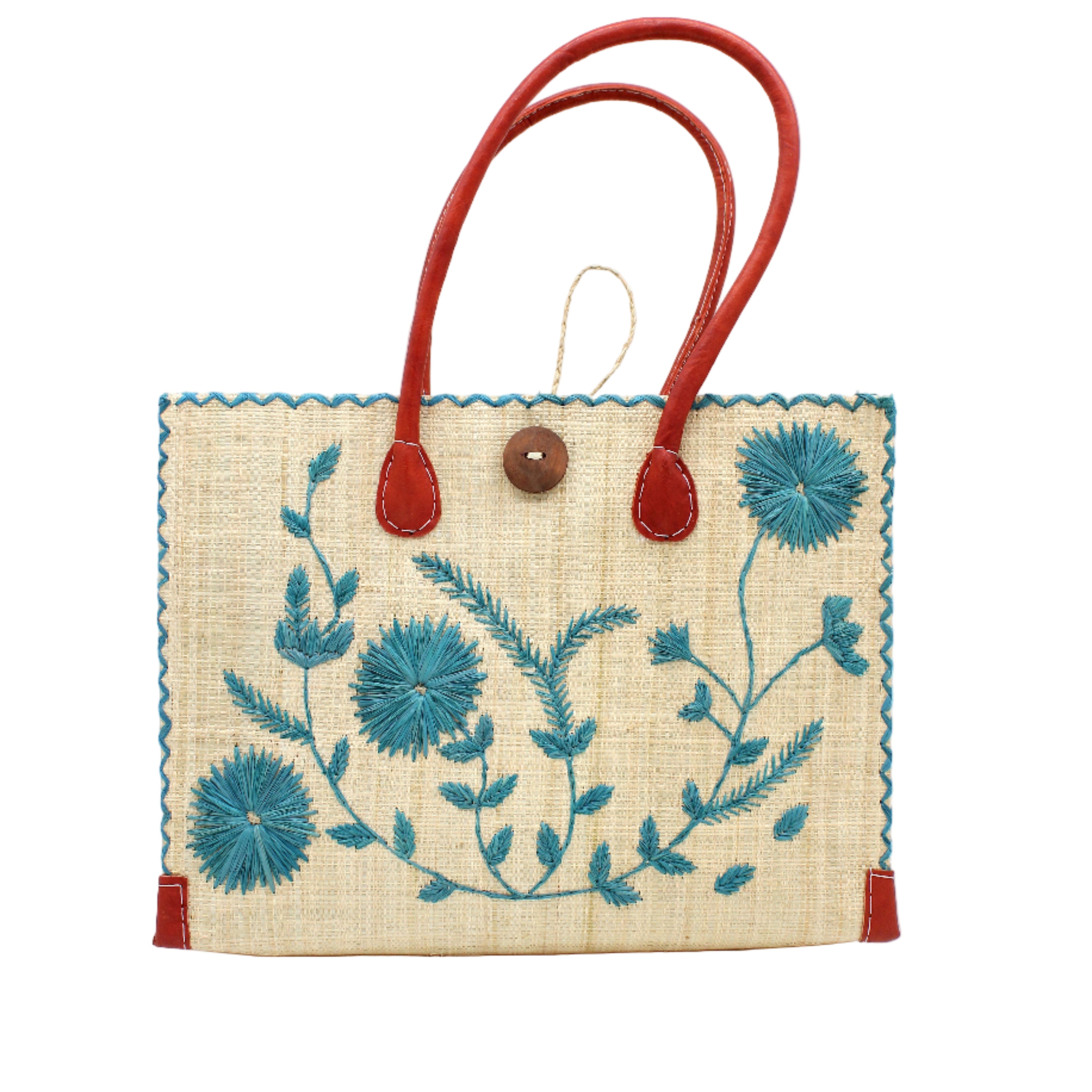 Zafran Natural & Turquoise Embroidered Straw Beach Bag with Floral Pattern handmade natural raffia palm fiber in a solid hue of natural straw color with asymmetrical floral leaf, vine, and flower pattern in turquoise blue/green with matching cross-stitch edging, leather handles, and wooden button closure shoulder bag handbag tote - Shebobo