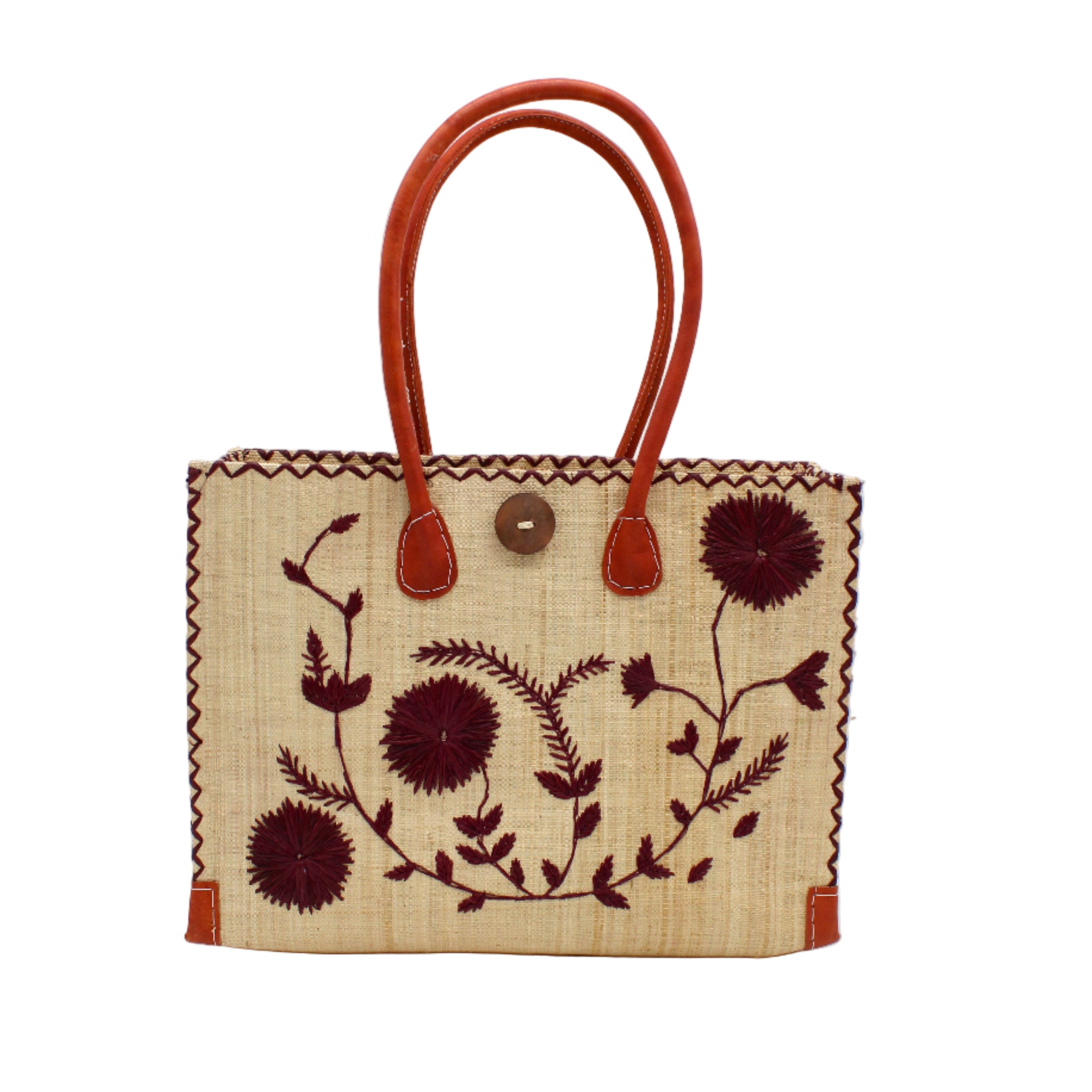 Zafran Natural & Black Embroidered Straw Beach Bag with Floral Pattern handmade natural raffia palm fiber in a solid hue of natural straw color with asymmetrical floral leaf, vine, and flower pattern in umberwine burgundy/bordeaux/claret/dark/red/purple with matching cross-stitch edging, leather handles, and wooden button closure shoulder bag handbag tote - Shebobo