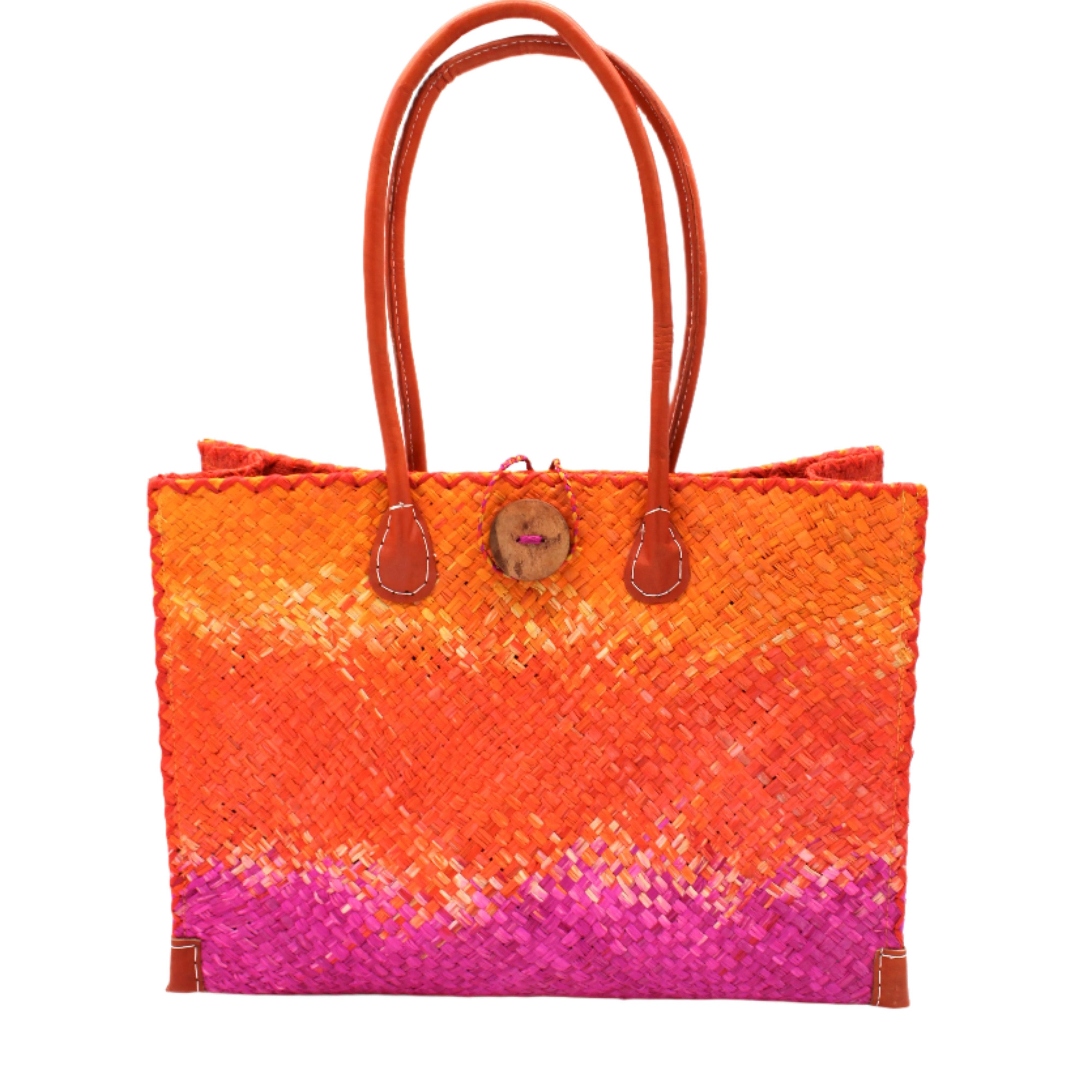Holden Fuchsia Ombre Zafran Straw Beach Bags handmade dip dyed raffia woven into a three part horizontal ombre pattern of coral orange/red, fuchsia pink, and saffron yellow with cross stitch edging, wooden button, and leather handles - Shebobo