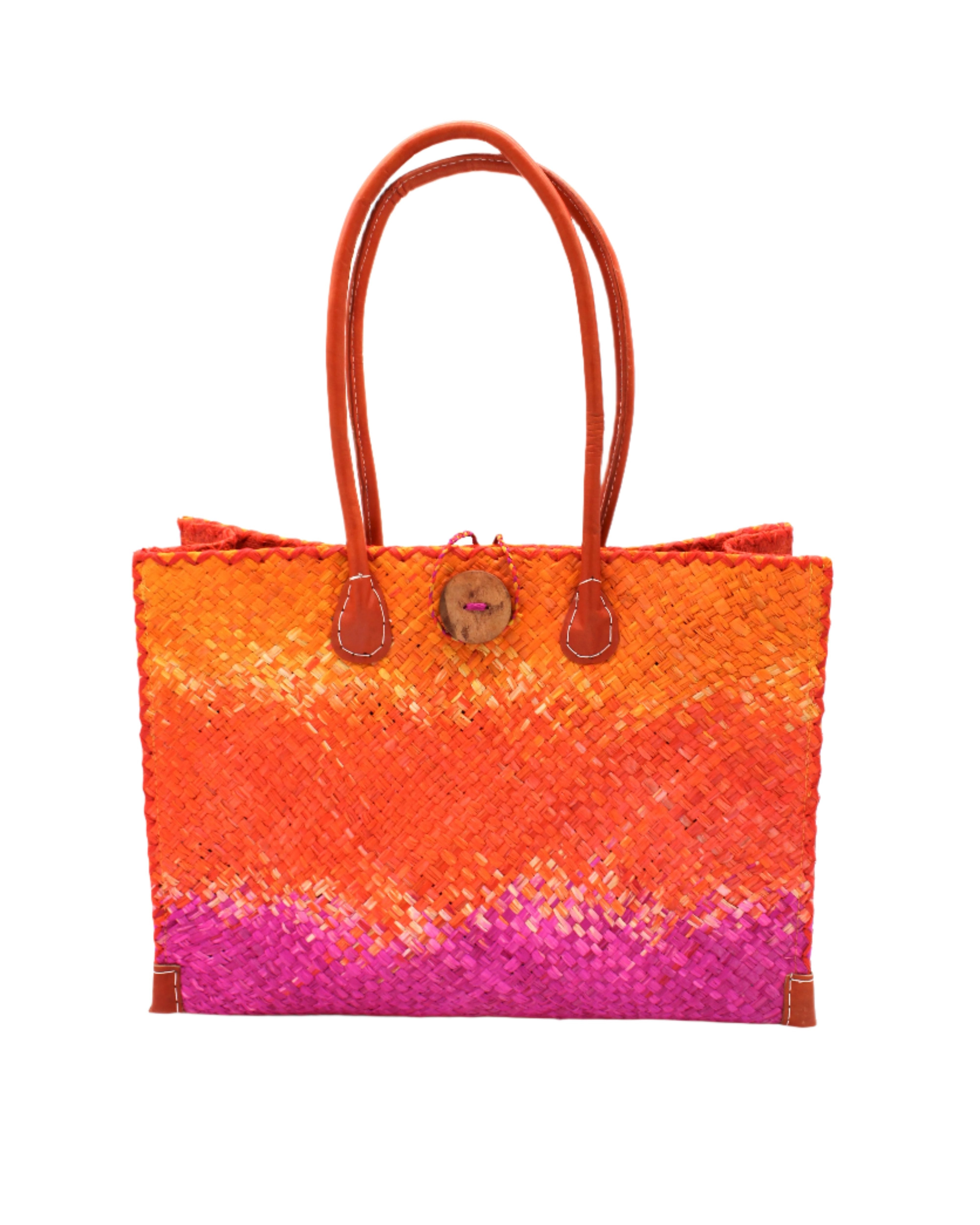 Holden Fuchsia Ombre Zafran Straw Beach Bags handmade dip dyed raffia woven into a three part horizontal ombre pattern of coral orange/red, fuchsia pink, and saffron yellow with cross stitch edging, wooden button, and leather handles - Shebobo