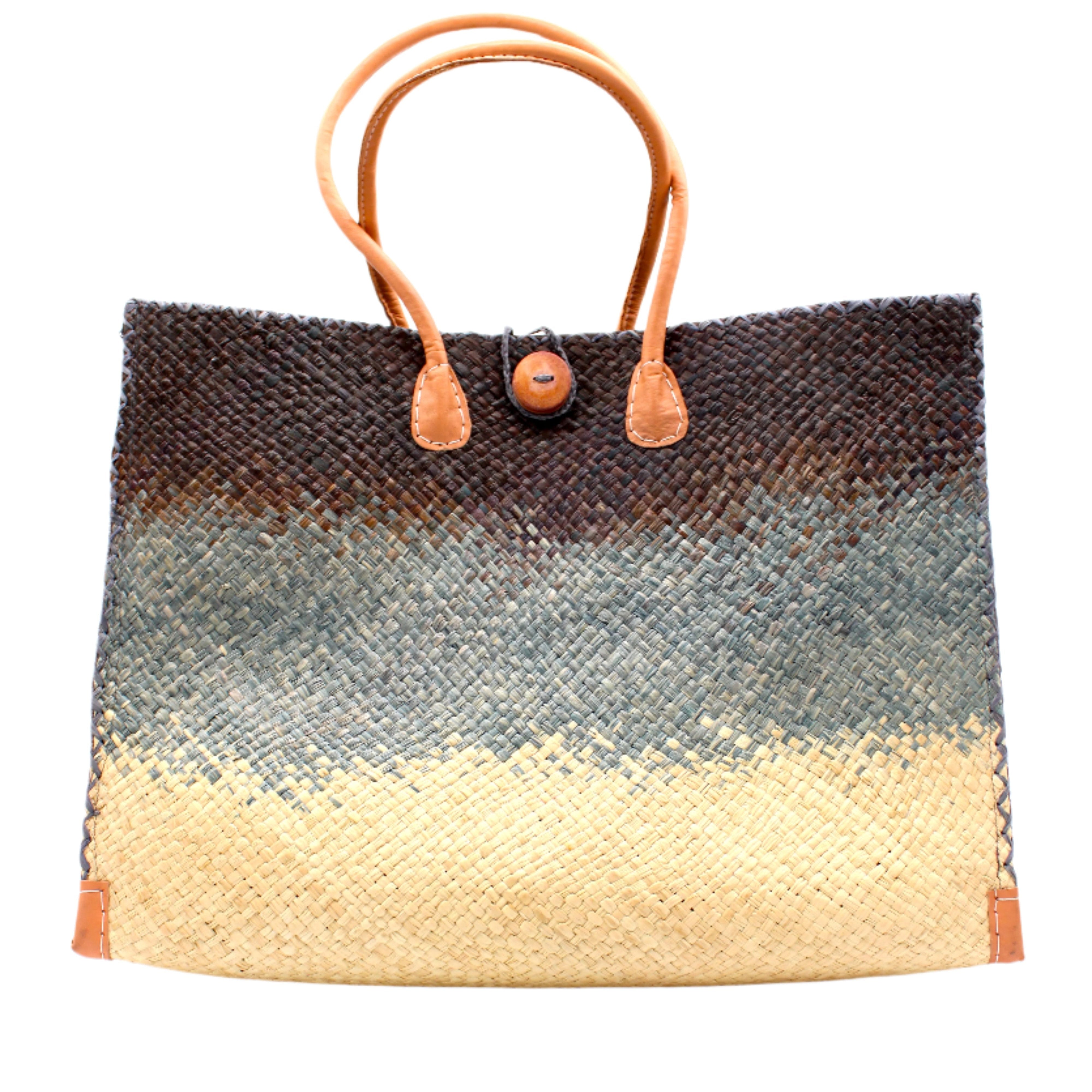 Holden Black Ombre Zafran Straw Beach Bags handmade dip dyed raffia woven into a three part horizontal ombre pattern of black on the top, grey in the middle and both sides, and natural on the bottom with cross stitch edging, wooden button, and leather handles - Shebobo