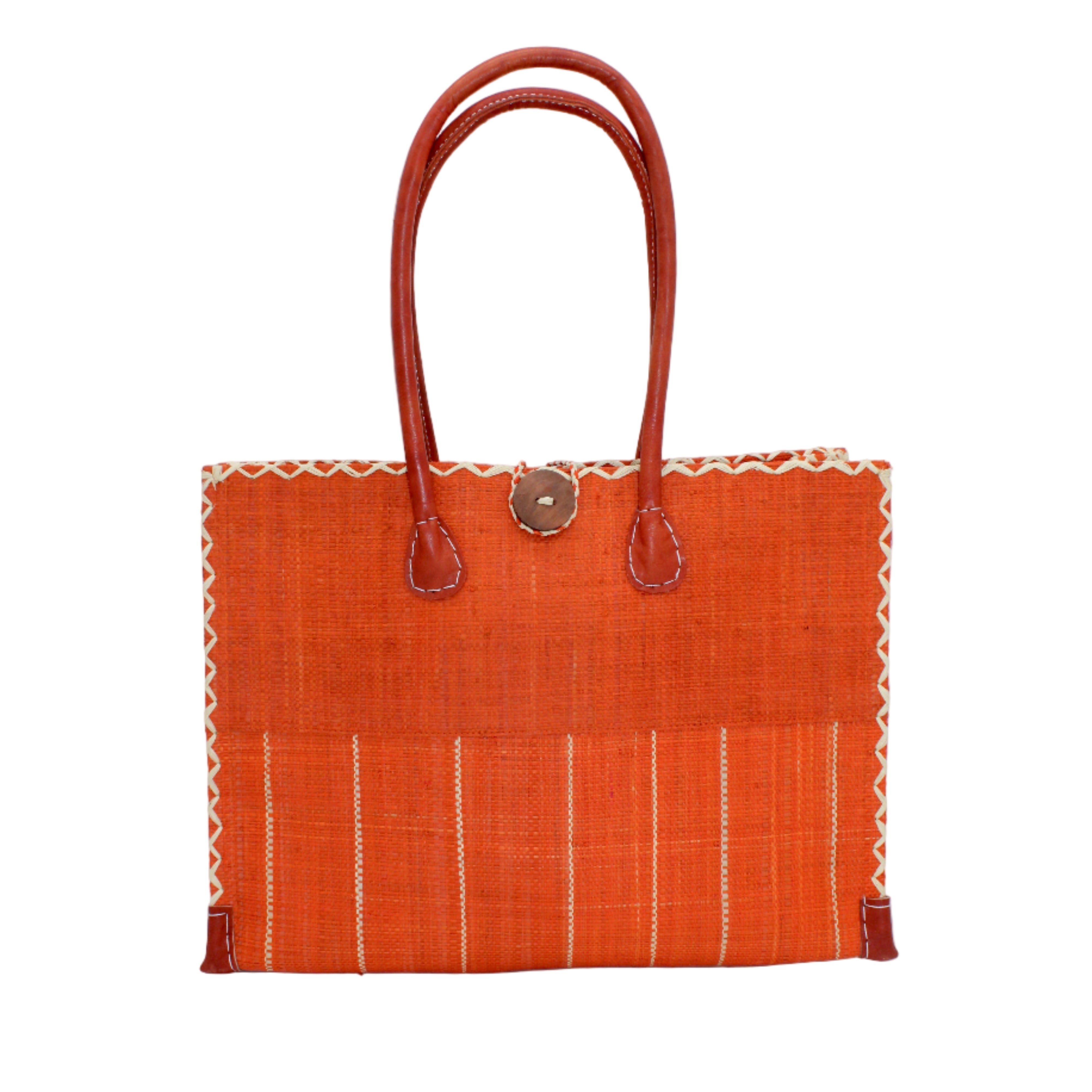 Zafran Two Tone Wide Stripe Coral Pinstripe Straw Beach Bag handmade loomed raffia palm fiber in a solid hue of coral orange/red on the top half of the bag and a multicolor multi-width vertical pinstripe stripe pattern with thin bands of natural straw color with wide bands of coral on the bottom half of the bag with leather handles and feet and matching crosshatch stitch edging shoulder bag - Shebobo
