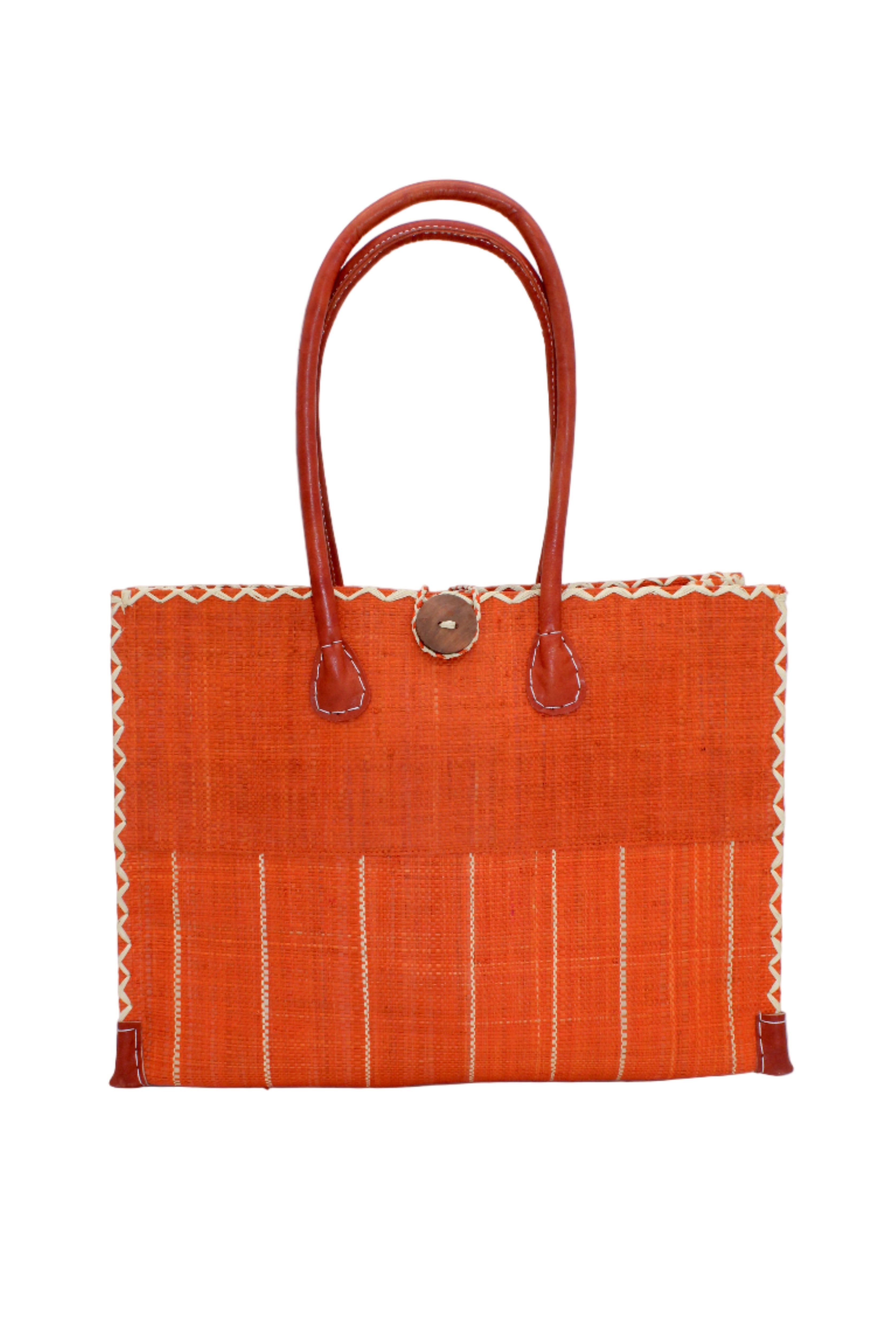 Zafran Two Tone Wide Stripe Coral Pinstripe Straw Beach Bag handmade loomed raffia palm fiber in a solid hue of coral orange/red on the top half of the bag and a multicolor multi-width vertical pinstripe stripe pattern with thin bands of natural straw color with wide bands of coral on the bottom half of the bag with leather handles and feet and matching crosshatch stitch edging shoulder bag - Shebobo
