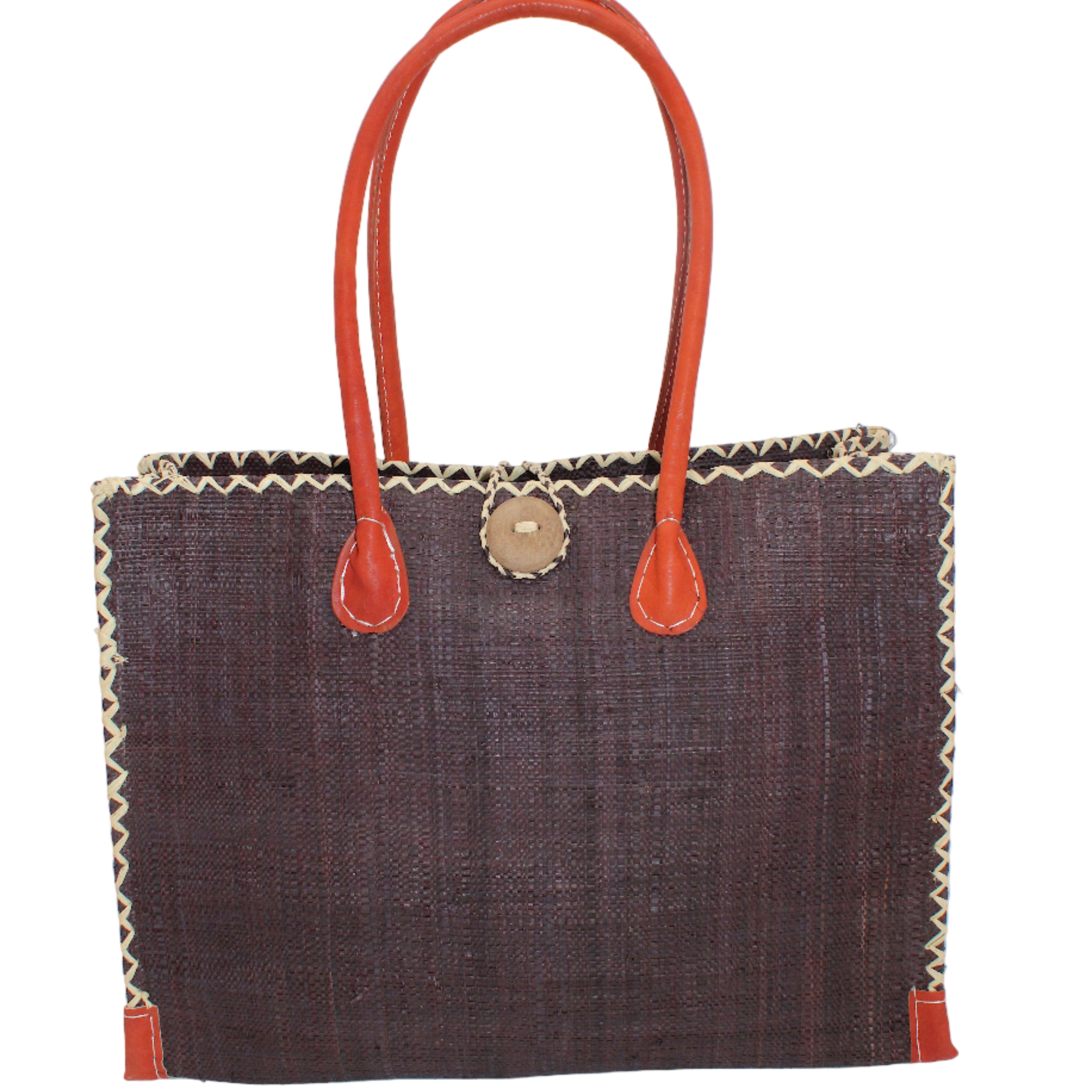 Zafran Straw Beach Bag with Plastic Liner handmade loomed raffia in a solid hue of Mocha dark/chocolate/brown with contrasting natural straw color cross stitch edge binding, wood button closure, and leather handles & feet plus assorted print plastic lining - Shebobo