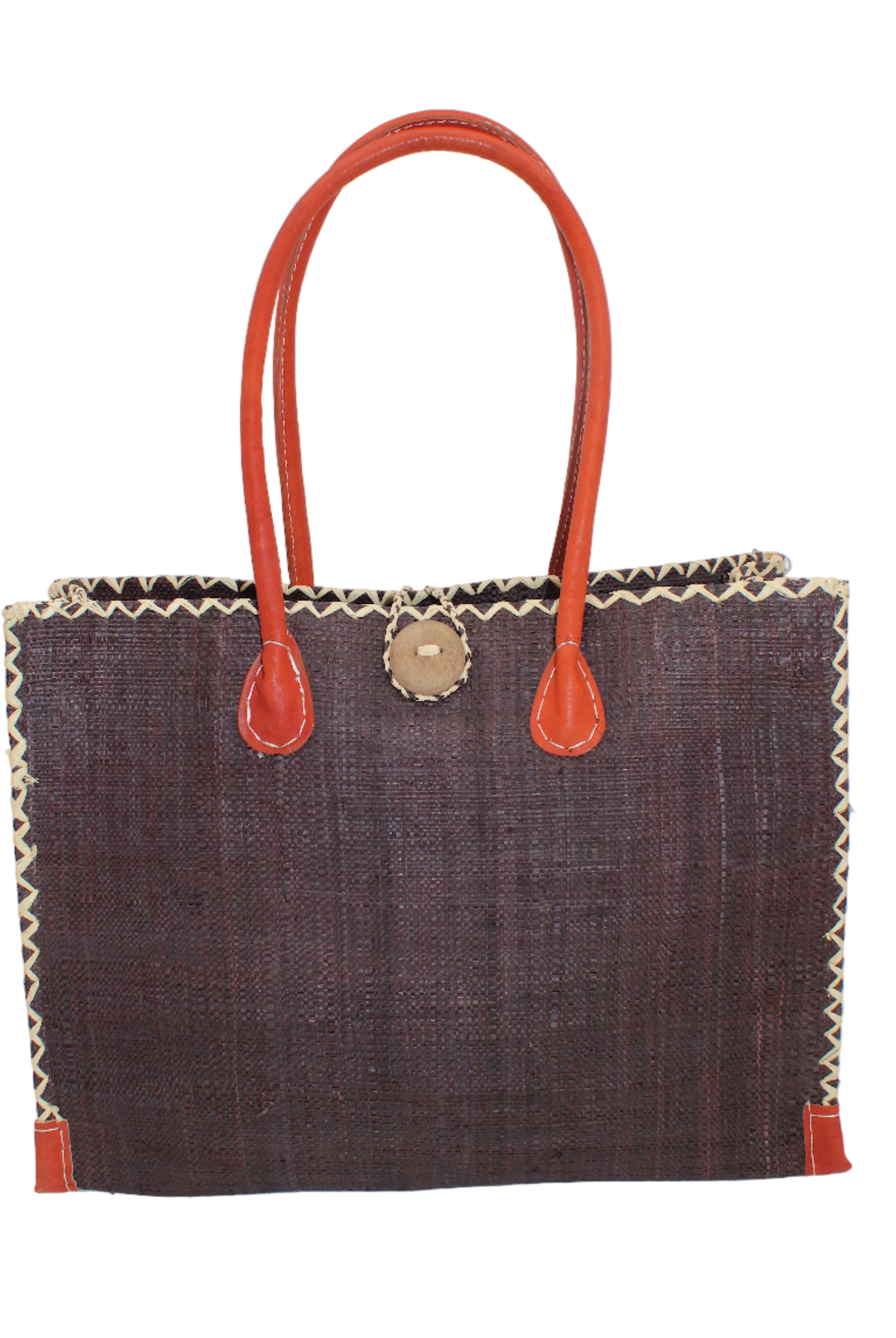 Zafran Straw Beach Bag with Plastic Liner handmade loomed raffia in a solid hue of Mocha dark/chocolate/brown with contrasting natural straw color cross stitch edge binding, wood button closure, and leather handles & feet plus assorted print plastic lining - Shebobo