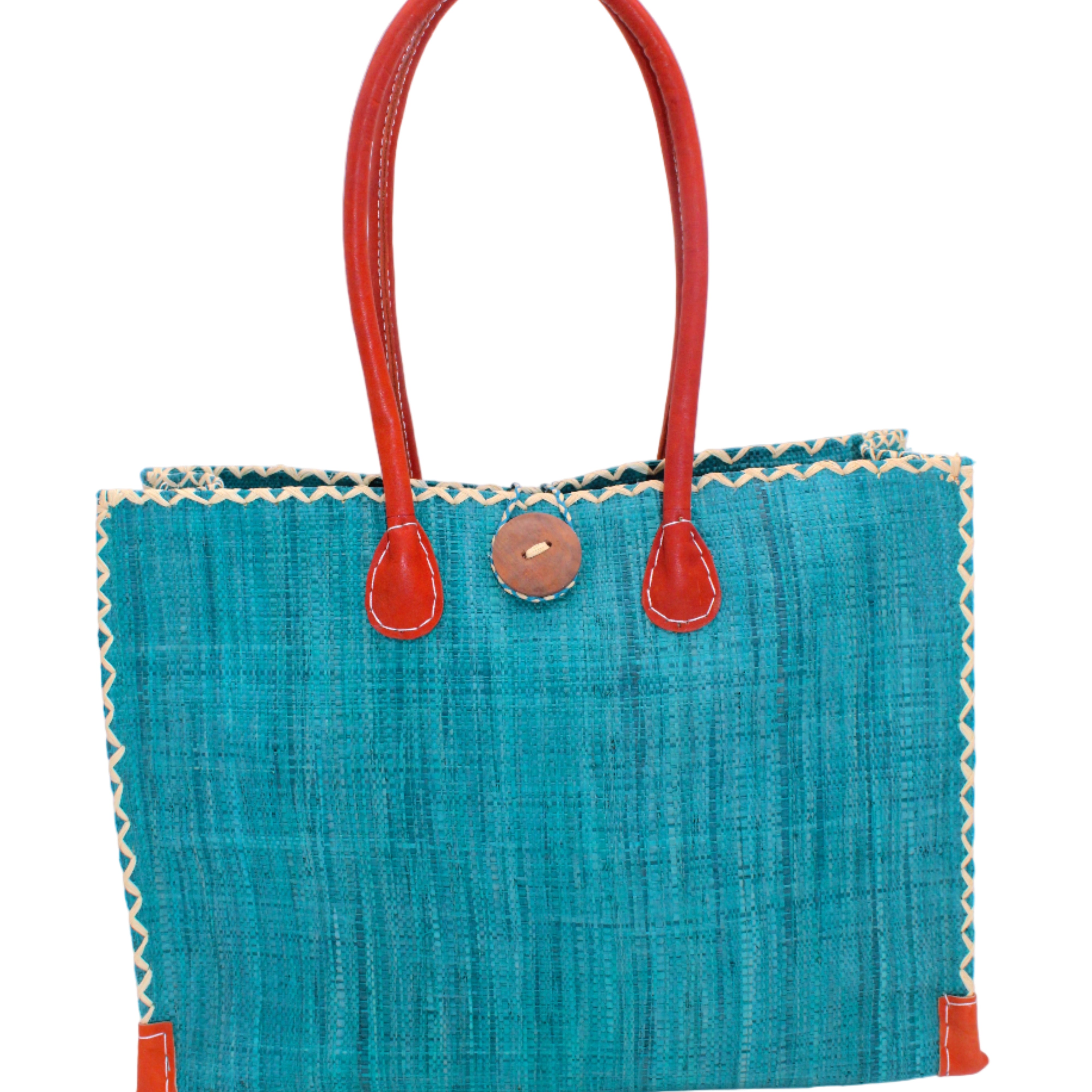 Zafran Straw Beach Bag with Plastic Liner handmade loomed raffia in a solid hue of Turquoise blue/green with contrasting natural straw color cross stitch edge binding, wood button closure, and leather handles & feet plus assorted print plastic lining - Shebobo