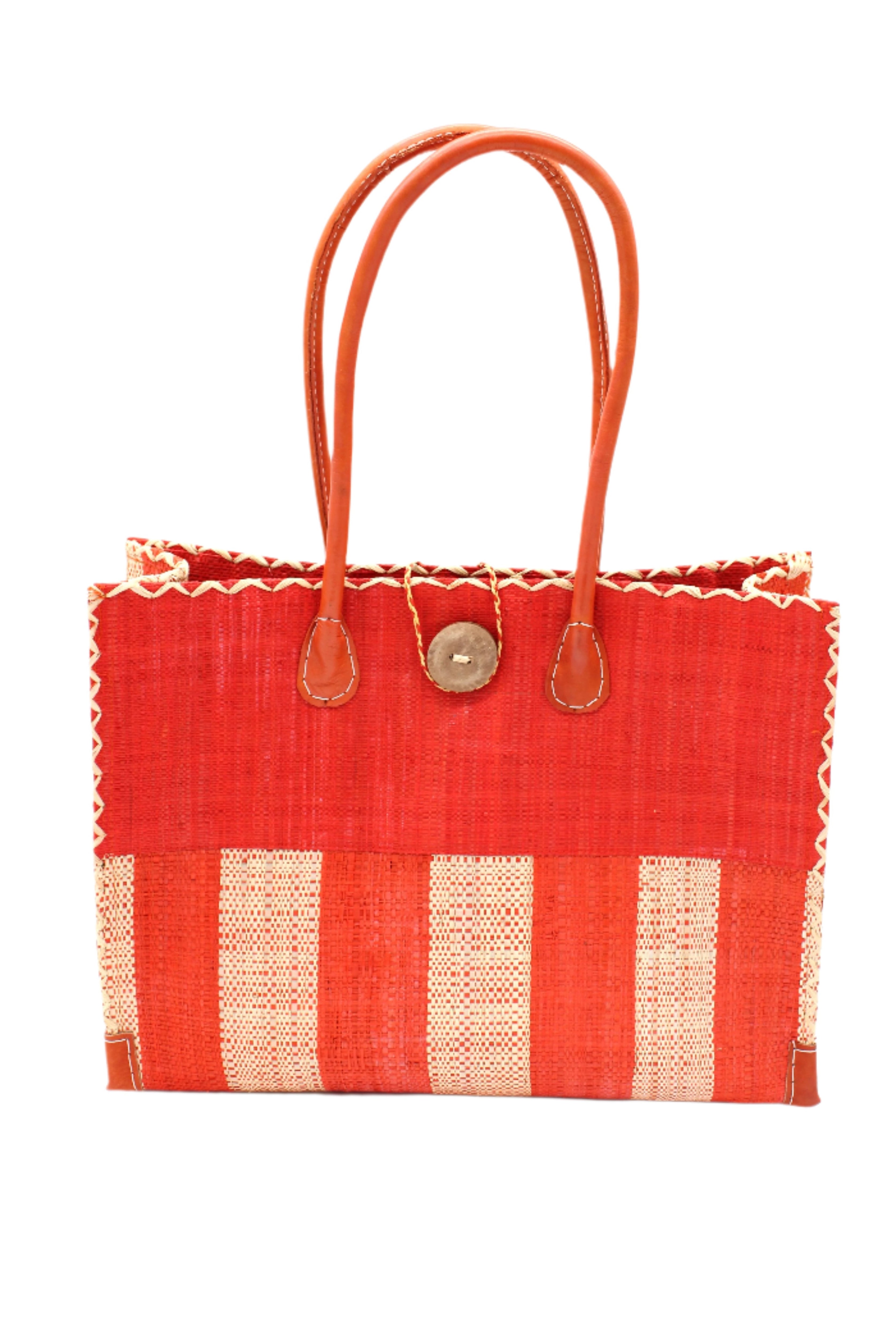 Zafran Two Tone Wide Stripe Coral and Natural Straw Beach Bag handmade loomed raffia palm fiber in a solid hue of coral orange/red on the top half of the bag and a two tone even width vertical wide stripe pattern of coral and natural straw color on the bottom half of the bag with leather handles and feet and matching crosshatch stitch edging shoulder bag - Shebobo