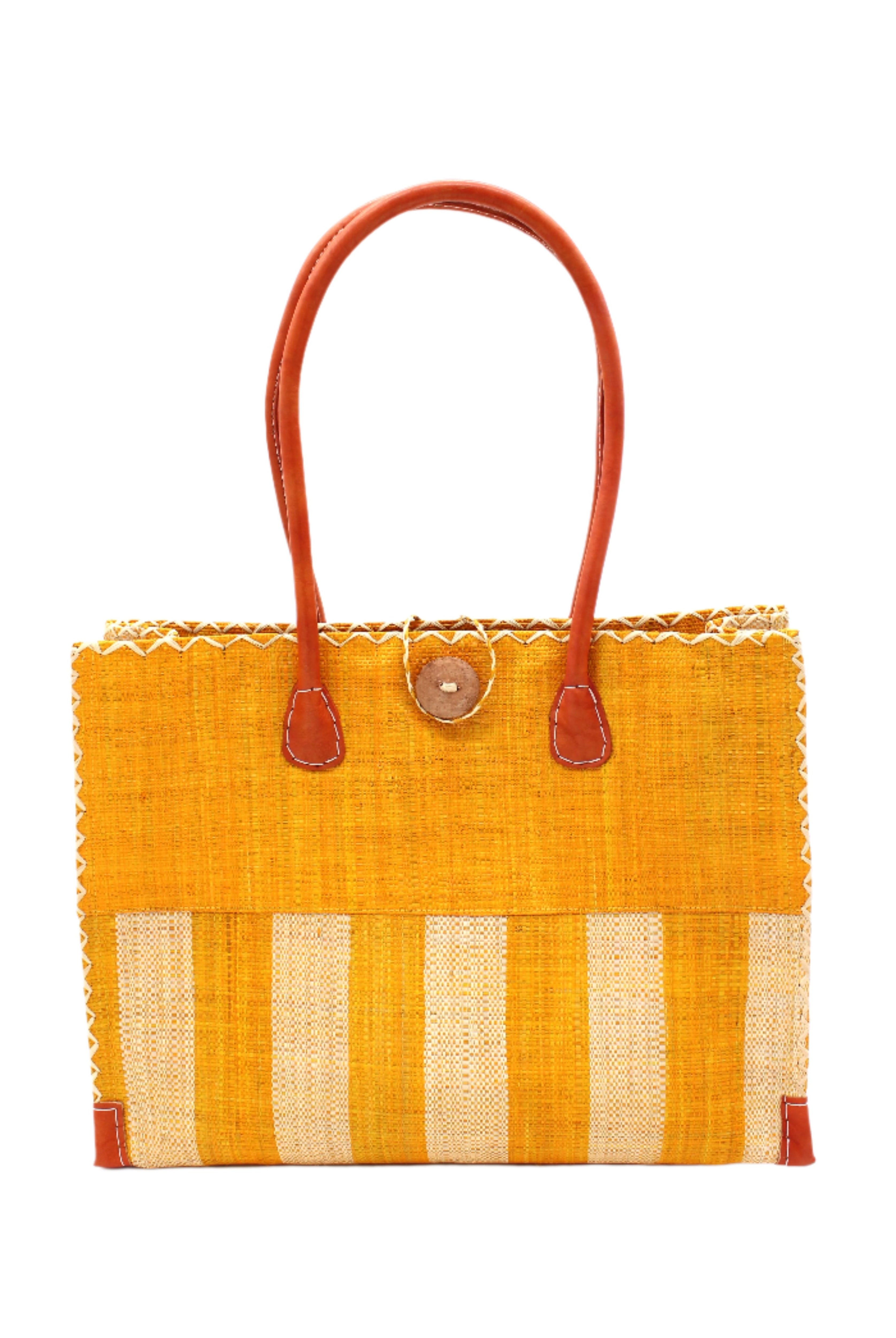 Zafran Two Tone Wide Stripe Saffron and Natural Straw Beach Bag handmade loomed raffia palm fiber in a solid hue of saffron yellow/orange on the top half of the bag and a two tone even width vertical wide stripe pattern of saffron and natural straw color on the bottom half of the bag with leather handles and feet and matching crosshatch stitch edging shoulder bag - Shebobo