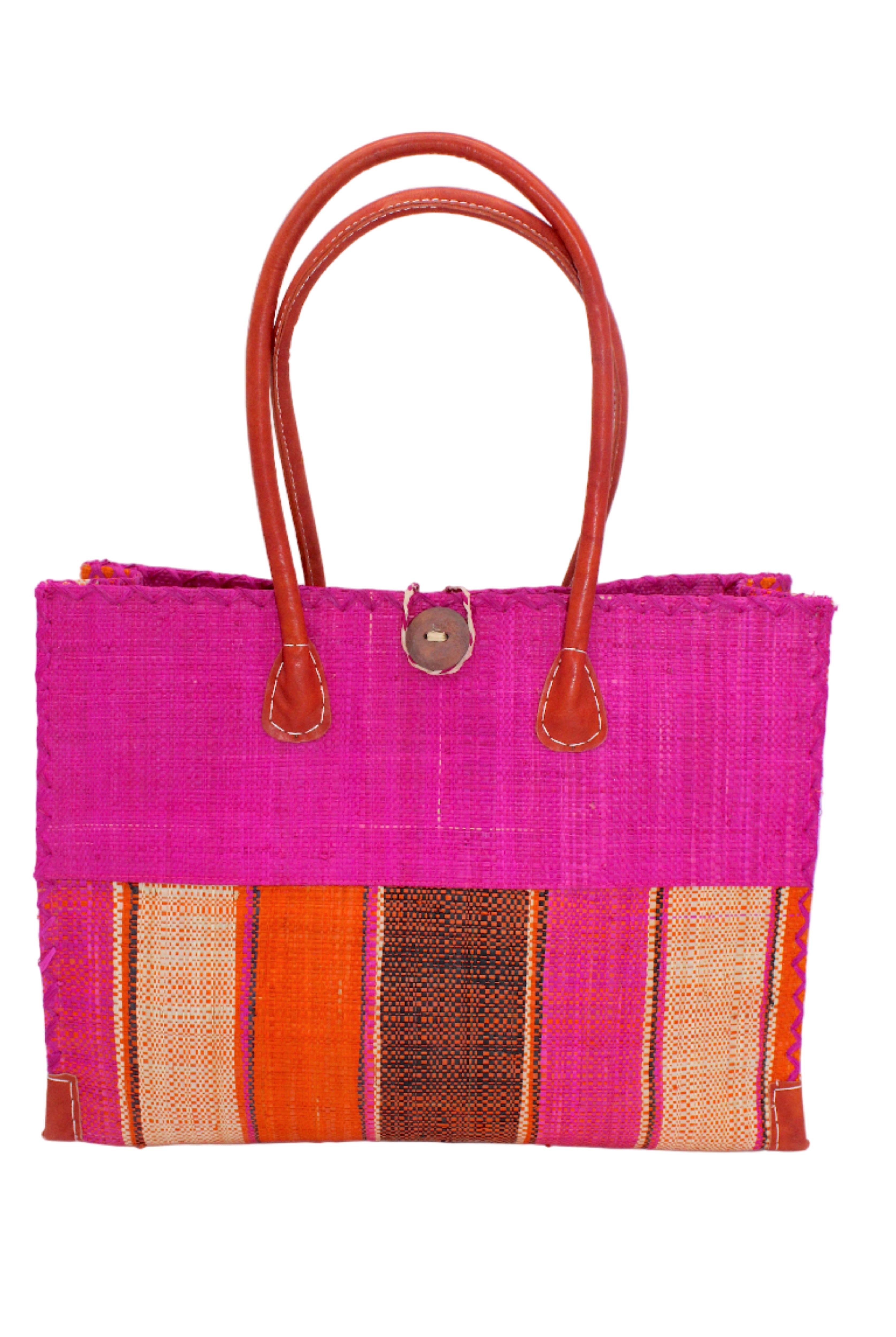 Zafran Two Tone Wide Stripe Whimsy Swirl Straw Beach Bag handmade loomed raffia palm fiber in a solid hue of Fuchsia hot/bright/barbie/pink on the top half of the bag and a multicolor multi-width vertical stripe pattern of black, coral red/orange, fuchsia, and natural straw color on the bottom half of the bag with leather handles and feet and matching crosshatch stitch edging shoulder bag - Shebobo