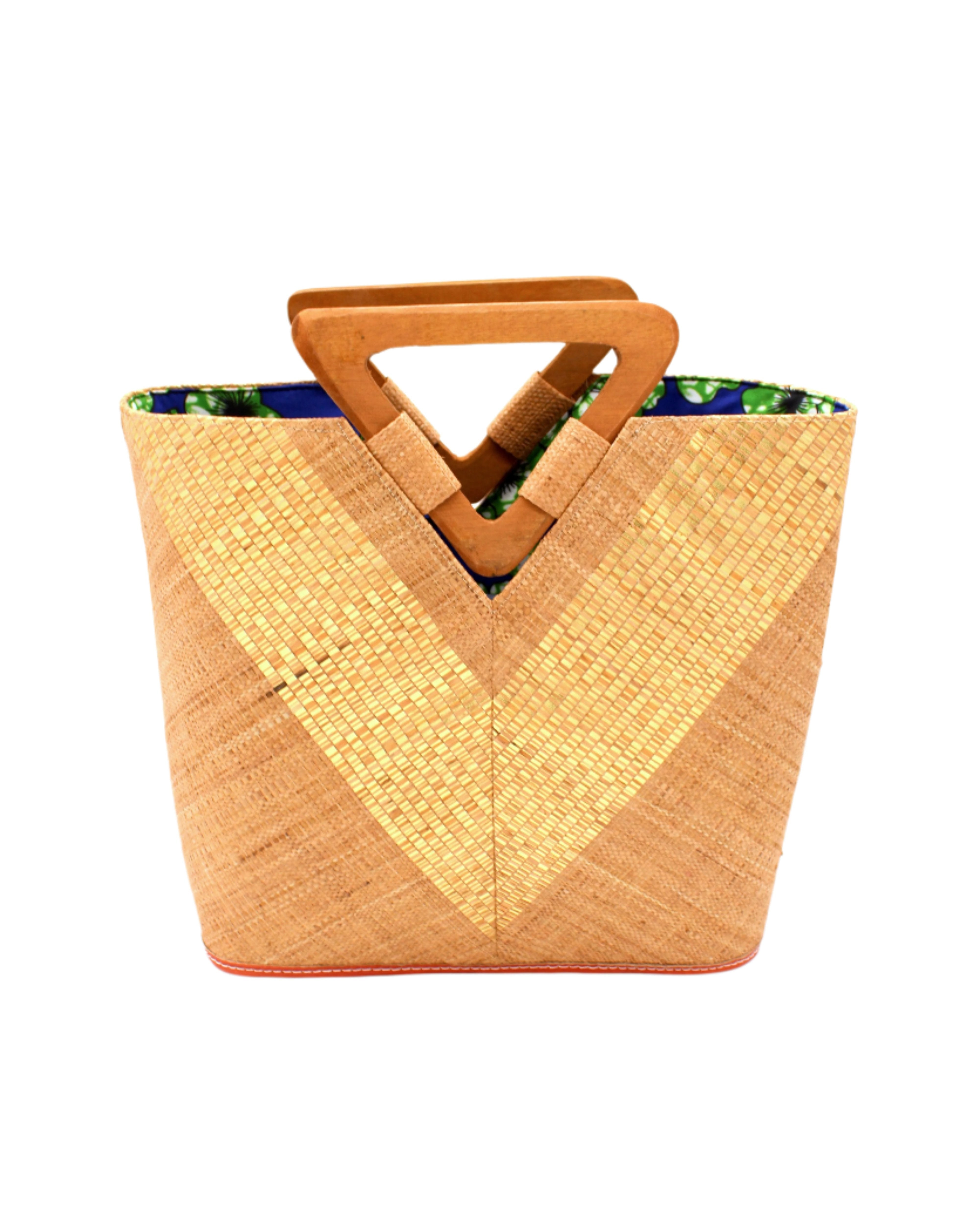 Zuki Wynwood Cappuccino Straw Handbag with Metallic Detailing & Wood Triangle Handle handmade loomed raffia palm fiber in a solid hue of cappuccino light/brown/beige with incorporated vegan leather gold metallic strands in a V pattern across the front and back of the bag with assorted print African wax cloth liners and carved wooden triangle handle purse - Shebobo
