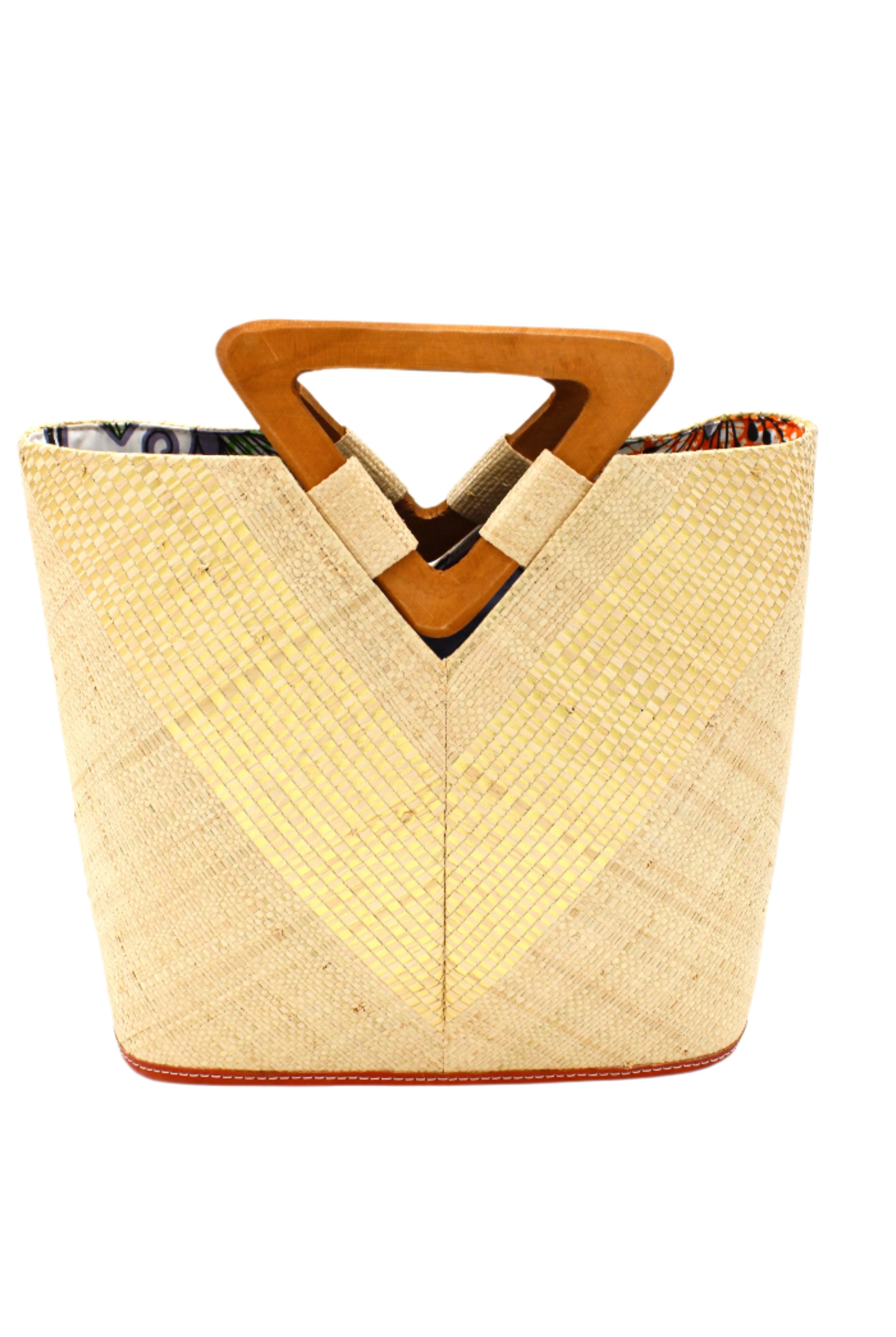 Zuki Wynwood Natural Straw Handbag with Metallic Detailing & Wood Triangle Handle handmade loomed raffia palm fiber in a solid hue of natural straw color with incorporated vegan leather gold metallic strands in a V pattern across the front and back of the bag with assorted print African wax cloth liners and carved wooden triangle handle purse - Shebobo