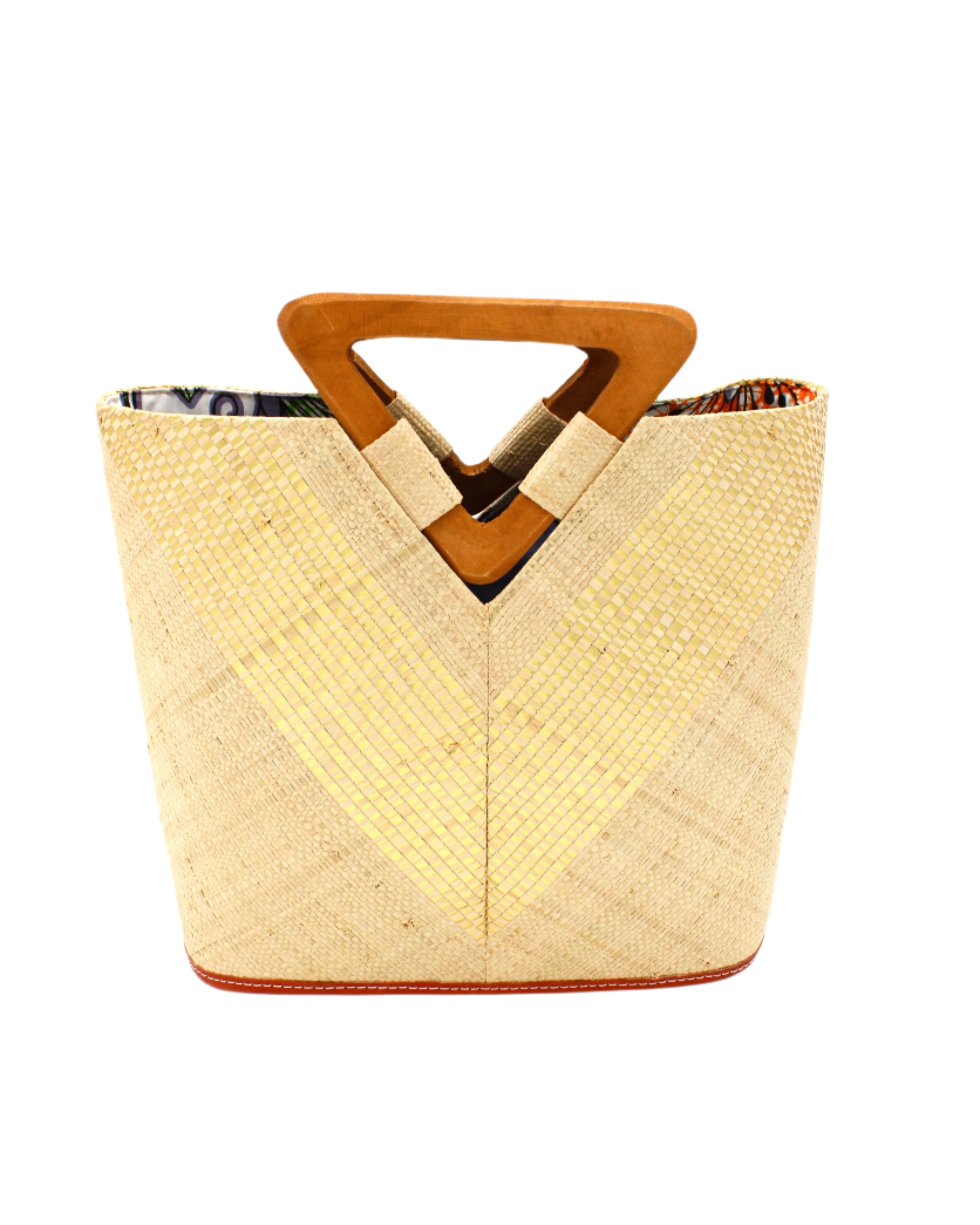 Zuki Wynwood Natural Straw Handbag with Metallic Detailing & Wood Triangle Handle handmade loomed raffia palm fiber in a solid hue of natural straw color with incorporated vegan leather gold metallic strands in a V pattern across the front and back of the bag with assorted print African wax cloth liners and carved wooden triangle handle purse - Shebobo