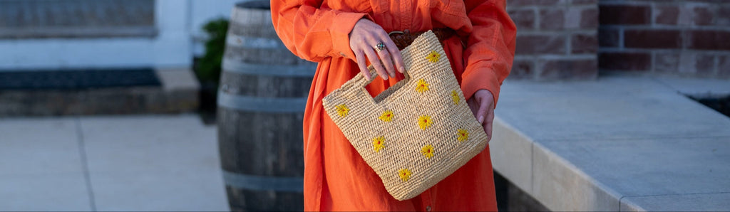 Model wearing Leo Crochet Granny Square Two Tone Black & Natural Straw Color Handmade Multicolor Beach Bag Shoulder Bag Handbag - Shebobo