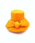 Cara Saffron big bow embellishment handmade loomed raffia in a solid hue of saffron yellow/orange straw bucket style cloche sun hat with matching oversized bow - Shebobo