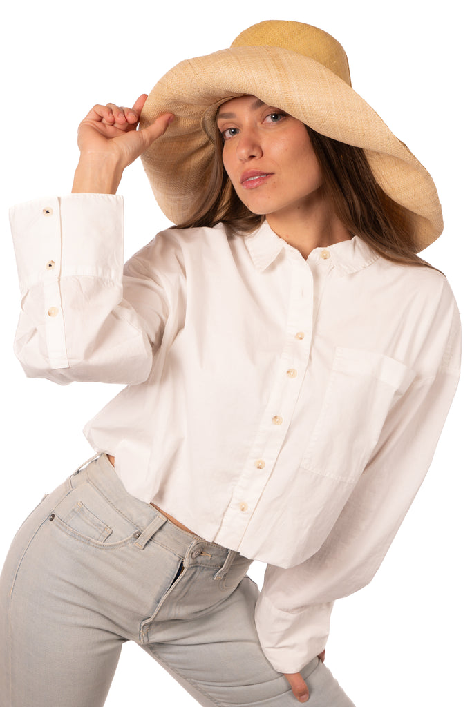 Model wearing 7" Brim Two Tone Butter Straw Hat handmade loomed raffia color block pattern of the top half butter/light yellow and the bottom half natural straw color - Shebobo