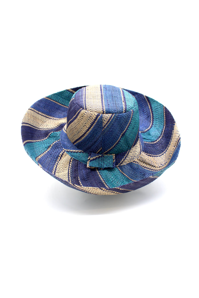 5" & 7" Wide Brim Blue Swirl Multicolor Stripe Pattern Packable Straw Sun Hat handmade loomed raffia in multi width bands of navy blue, turquoise blue, and natural straw color create a striped swirl pattern - Shebobo