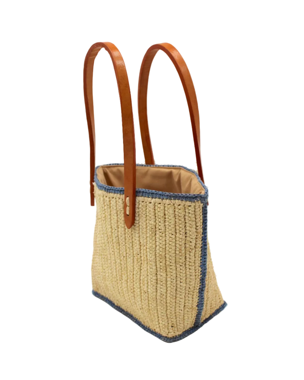 Side view Adele Mini Crochet Raffia Straw Handbag Purse with Colored Edge Natural & Denim handmade crochet raffia palm fiber in a solid hue of natural straw color with contrasting narrow band of denim light/blue around the outer edges of the bag with subtle vertical band texture and leather handles - Shebobo