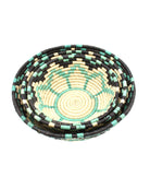 Detail view Amara Raffia Straw Decor Display Basket Bowls: Set of 3 handmade woven natural raffia palm fiber in a crochet loop technique concentric coiled circular pattern with natural straw color centered in the bottom with turquoise blue/green, natural, and black geometric floral design pattern up the sides of the bowls set of small, medium, and large straw display bowls - Shebobo