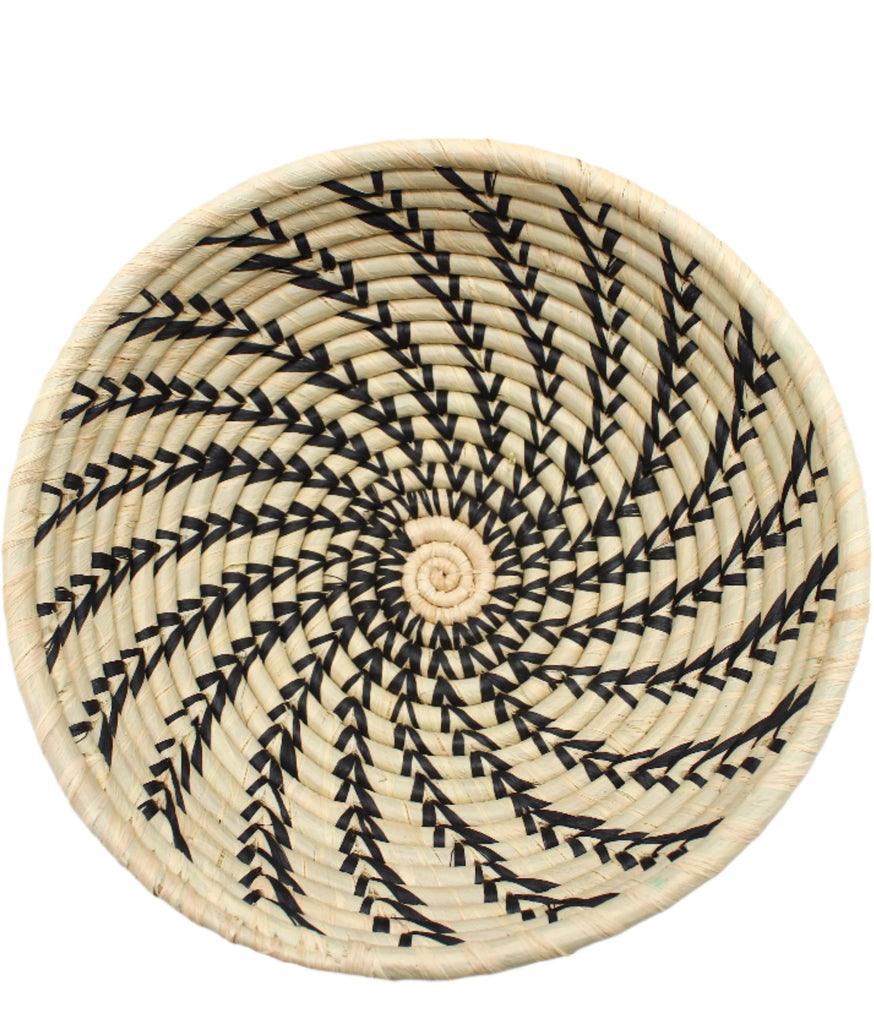 Detail view Amara Raffia Straw Decor Display Basket Bowls: Set of 3 handmade woven natural raffia palm fiber in a crochet loop technique concentric coiled circular pattern with natural straw color centered in the bottom and that go up the sides of the bowls with contrasting black swirl stitch pattern and matching natural rim/edge set of small, medium, and large straw display bowls - Shebobo