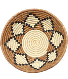 Detail View Amara Raffia Straw Decor Display Basket Bowls: Set of 3 handmade woven natural raffia palm fiber in a crochet loop technique concentric coiled circular pattern with natural straw color centered in the bottom with cinnamon/tobacco/brown sides and natural diamond with black edges pattern set of small, medium, and large straw display bowls - Shebobo