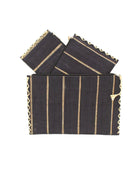 Amelia Set of 3 Black Nesting Zippered Straw Clutches Pinstripe Pattern handmade loomed raffia in wide vertical bands of black with narrow bands of natural straw color with matching zipper and braided zipper pull with cross stitch edging in three sizes of small, medium, and large - Shebobo