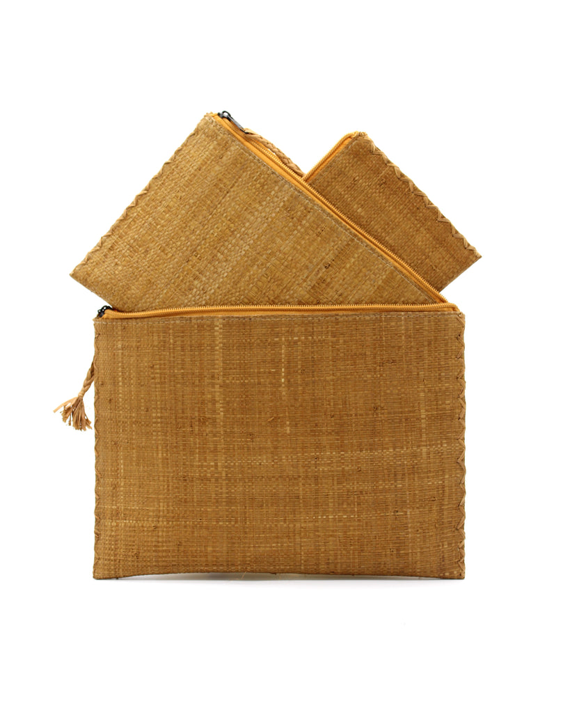 Amelia Set of 3 Cinnamon/Tobacco/Brown Nesting Zippered Straw Clutches Solid Colors handmade loomed raffia in a solid hue with matching zipper and braided zipper pull with cross stitch edging in three sizes of small, medium, and large - Shebobo