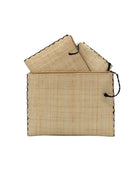 Amelia Set of 3 Natural straw color Nesting Zippered Straw Clutches Solid Colors handmade loomed raffia in a solid hue with matching zipper and braided zipper pull with cross stitch edging in three sizes of small, medium, and large - Shebobo