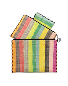 Amelia Set of 3 Nesting Zippered Straw Clutches Lollipop Multicolor Stripe Pattern handmade loomed raffia in multiple widths of vertical stripes in natural, orange, green, saffron, light blue, red, fuchsia, pink, black, grey, etc. with matching black zipper and braided zipper pull with cross stitch edging in three sizes of small, medium, and large - Shebobo