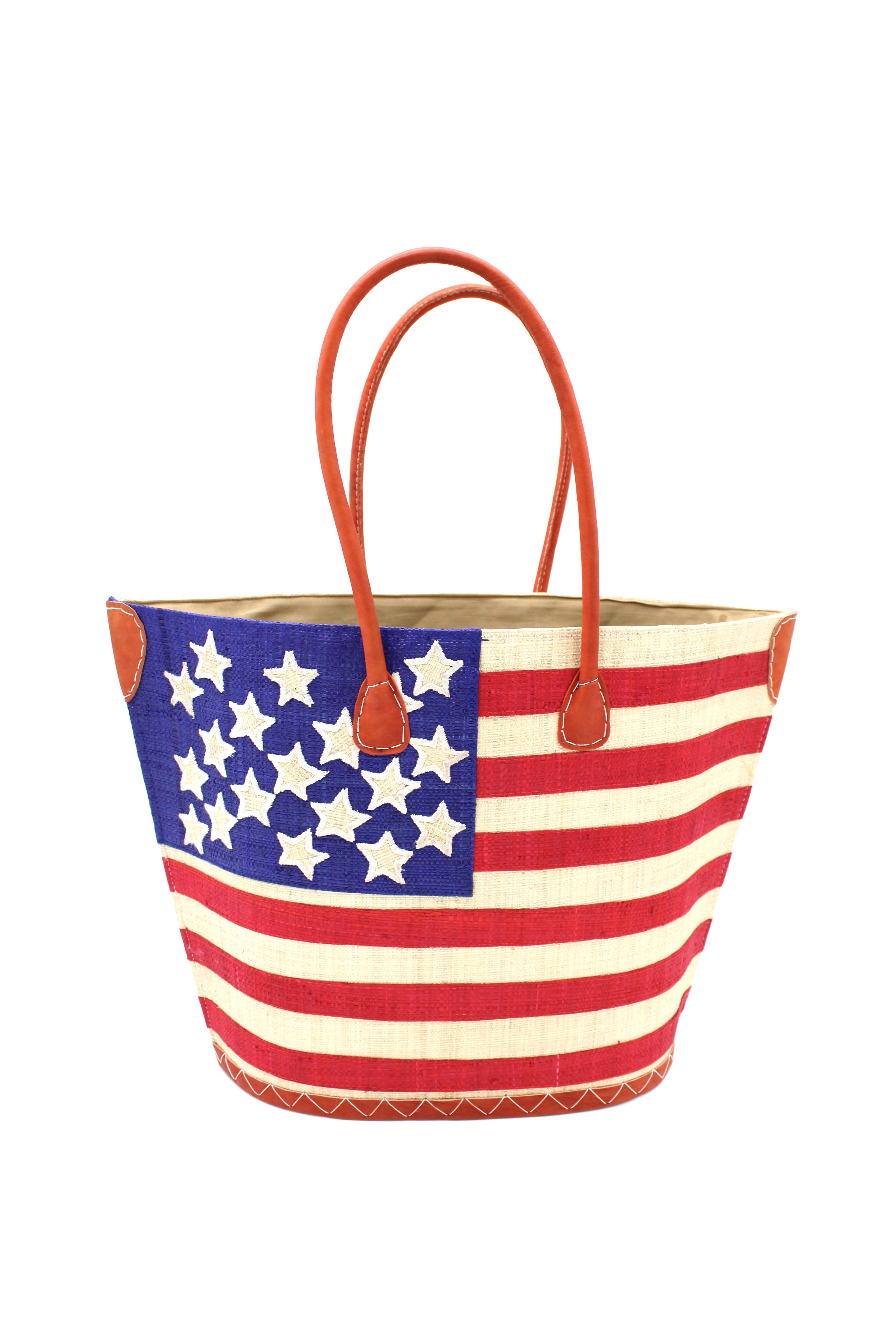 American Flag Straw Tote Bag handmade loomed raffia palm fiber in a multicolor dusk navy/dark/blue, red, and natural straw color patriotic American Flag pattern across the front of the bag with matching stitching and leather handles shoulder bag beach bag tote handbag - Shebobo