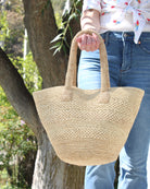 Model wearing Lizzie Crochet Straw & Leather Sandal Shoes