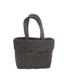 Anna Petal Pattern Crochet Straw Basket Handbag handmade natural raffia palm fiber in a solid hue of Black crochet in multiple textures resulting in a subtle pattern of vertical linked bands on the bottom 2/3 of the bag, and a floral petal or shell pattern on the upper third with rolled panel of links making up the handles Beach Bag Purse - Shebobo