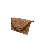 Side view Anna Petal Pattern Crochet Straw Over Shoulder Envelope Clutch Purse handmade raffia palm fiber in a solid hue of Cappuccino tea/light/brown crochet in multiple textures resulting in a subtle pattern of vertical linked bands on the bottom half of the bag, and a floral petal or shell pattern on the upper envelope flap with braided leather shoulder strap handbag shoulder bag - Shebobo