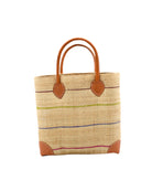 Augustine pinstripes straw basket bag handmade loomed raffia in natural wide horizontal bands with multicolor bright colors of coral red/orange, bordeaux dark red, lime, grey, and fuchsia pink small bands running through in a stripe pattern with leather accents and handles handbag purse - Shebobo