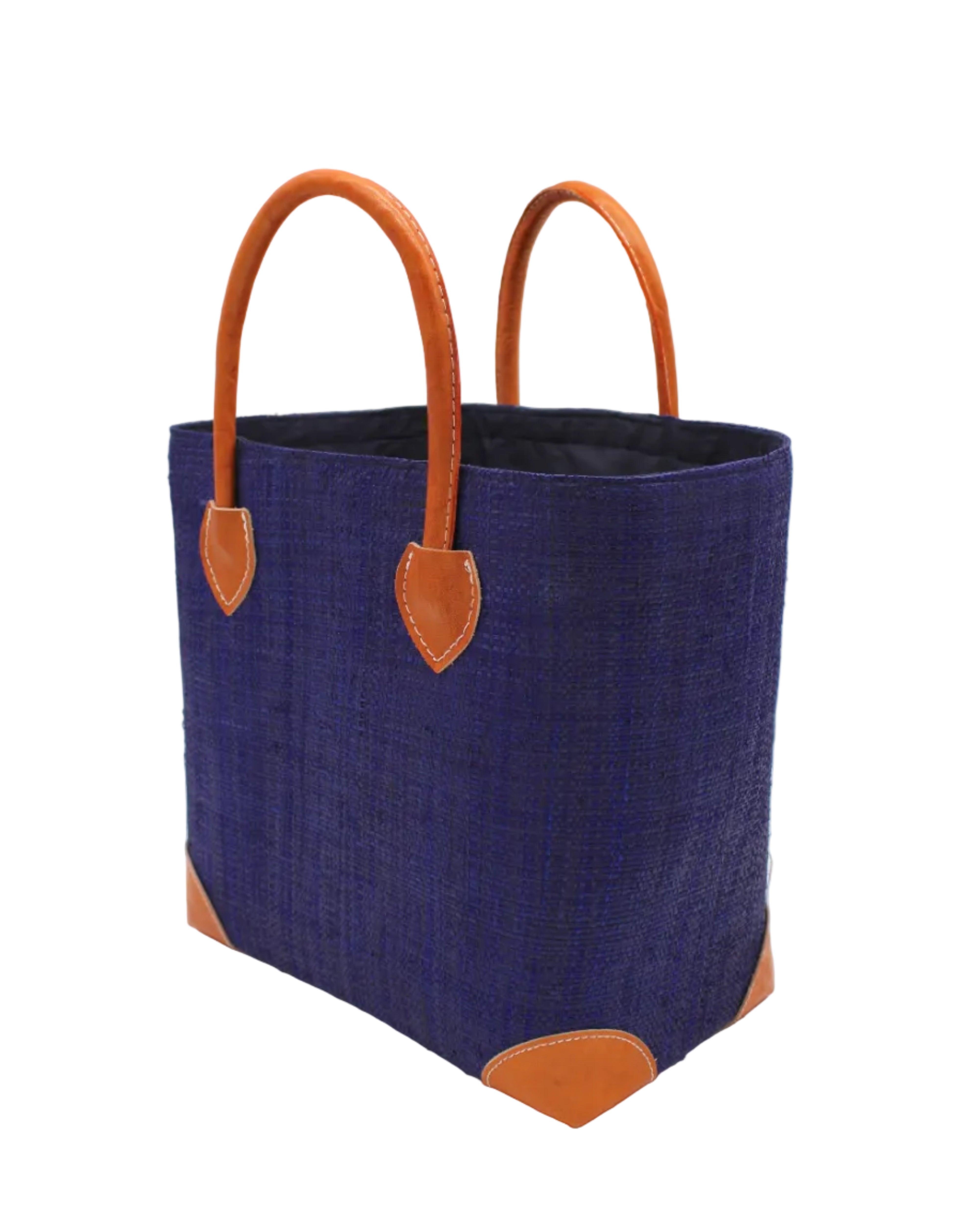 Side view Augustine Straw Basket Bag Azure handmade loomed raffia palm fiber in a solid hue of azure dusk/navy/dark/blue handbag purse with leather accents and handles beach bag - Shebobo