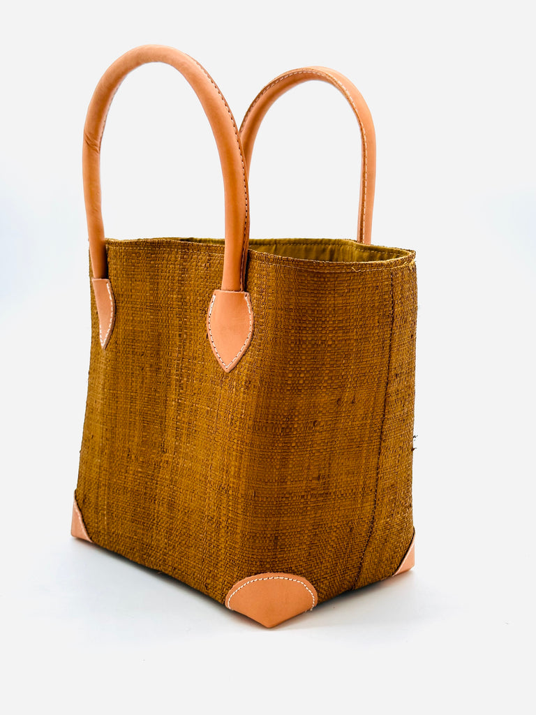 Augustine Straw Basket Bag handmade loomed raffia handbag with leather corners and handles in cinnamon/tobacco/brown - Shebobo