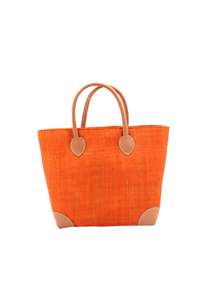 Augustine Straw Basket Bag Coral handmade loomed raffia palm fiber in a solid hue of coral orange/red handbag purse with leather accents and handles beach bag - Shebobo