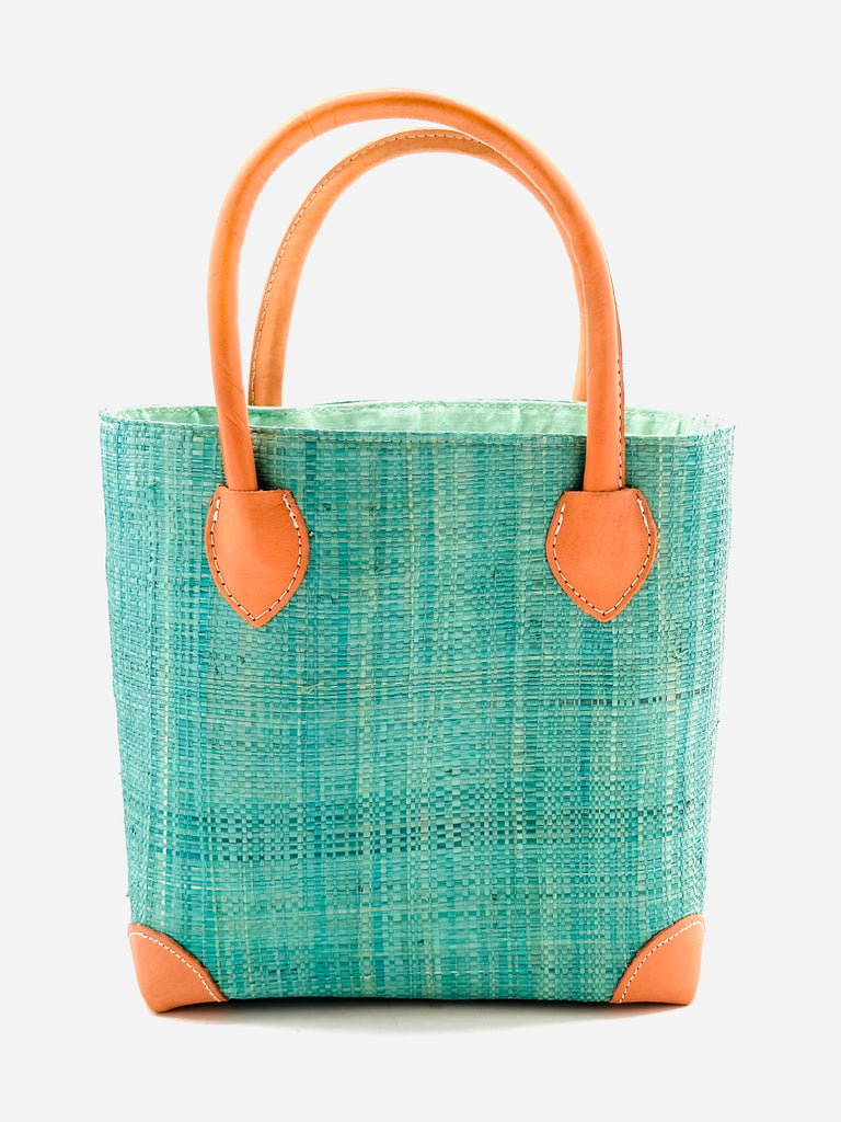 Augustine Straw Basket Bag handmade loomed raffia handbag with leather corners and handles in seafoam blue/green - Shebobo