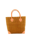 Augustine Straw Basket Bag Cinnamon handmade loomed raffia palm fiber in a solid hue of cinnamon/tobacco/brown handbag purse with leather accents and handles beach bag - Shebobo