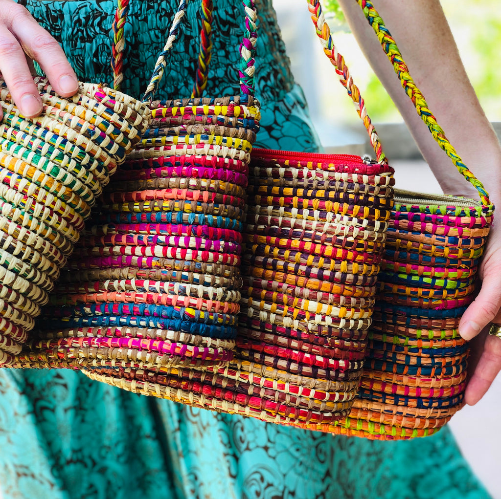 Model wearing Barbados multicolor handmade crochet raffia crossbody bag bright purse assorted colors shipped - Shebobo