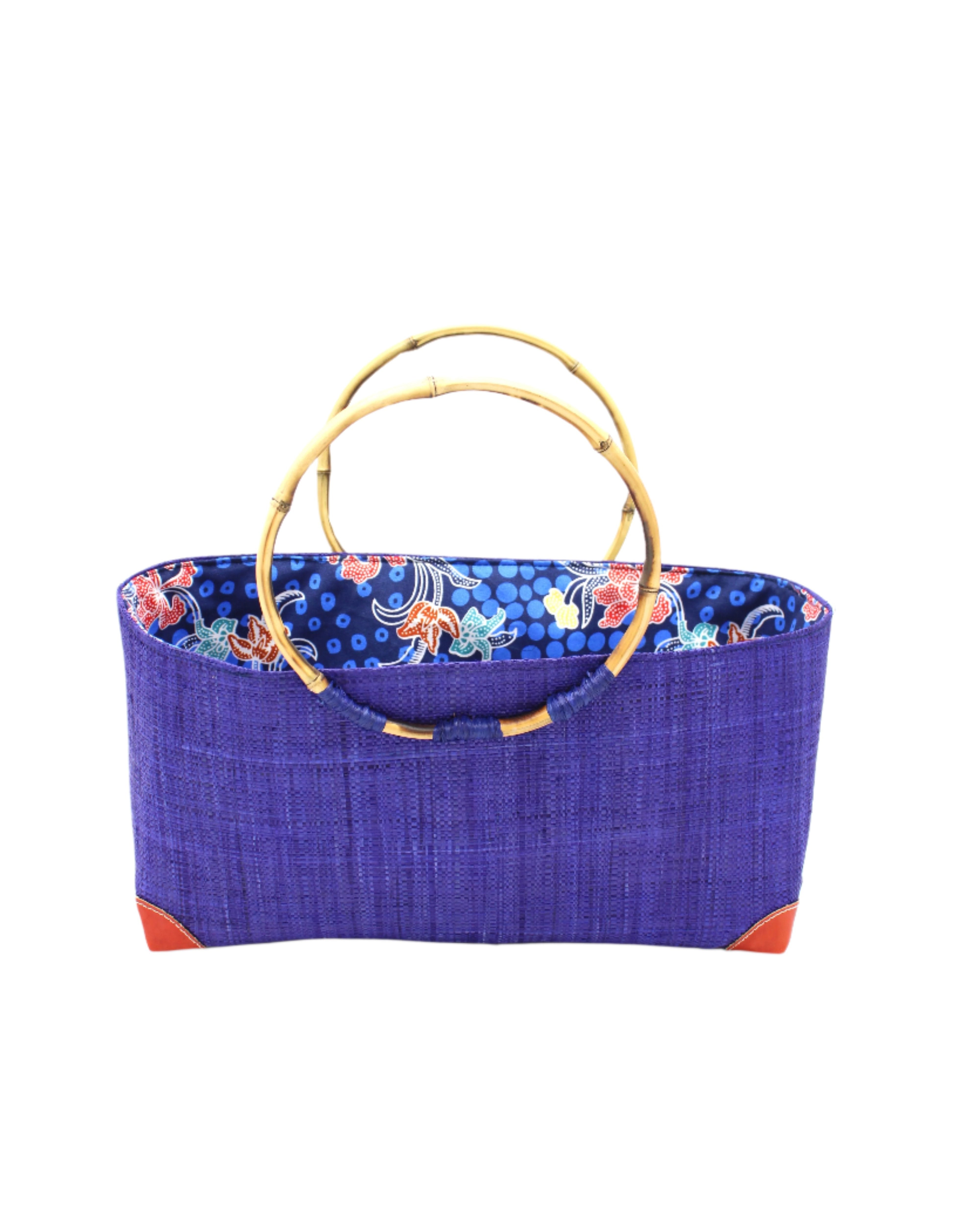 Bebe Straw Handbag with Bamboo Handle handmade loomed natural raffia palm fiber in a solid hue of Dusk dark/navy/blue with molded circular bamboo handles, leather feet, and assorted print African wax-cloth fabric liner - Shebobo