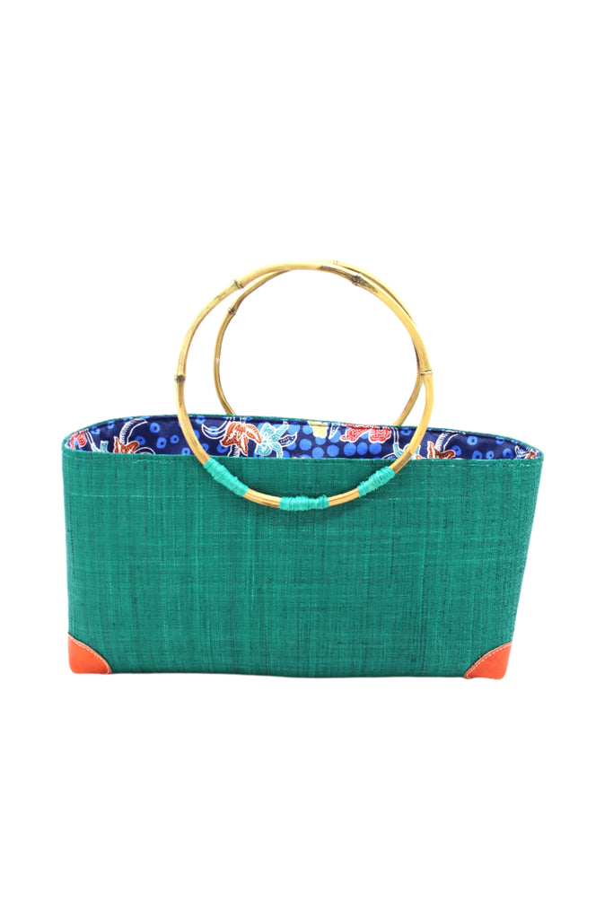 Bebe Straw Handbag with Bamboo Handle handmade loomed natural raffia palm fiber in a solid hue of teal dark/blue/green with molded circular bamboo handles, leather feet, and assorted print African wax-cloth fabric liner - Shebobo