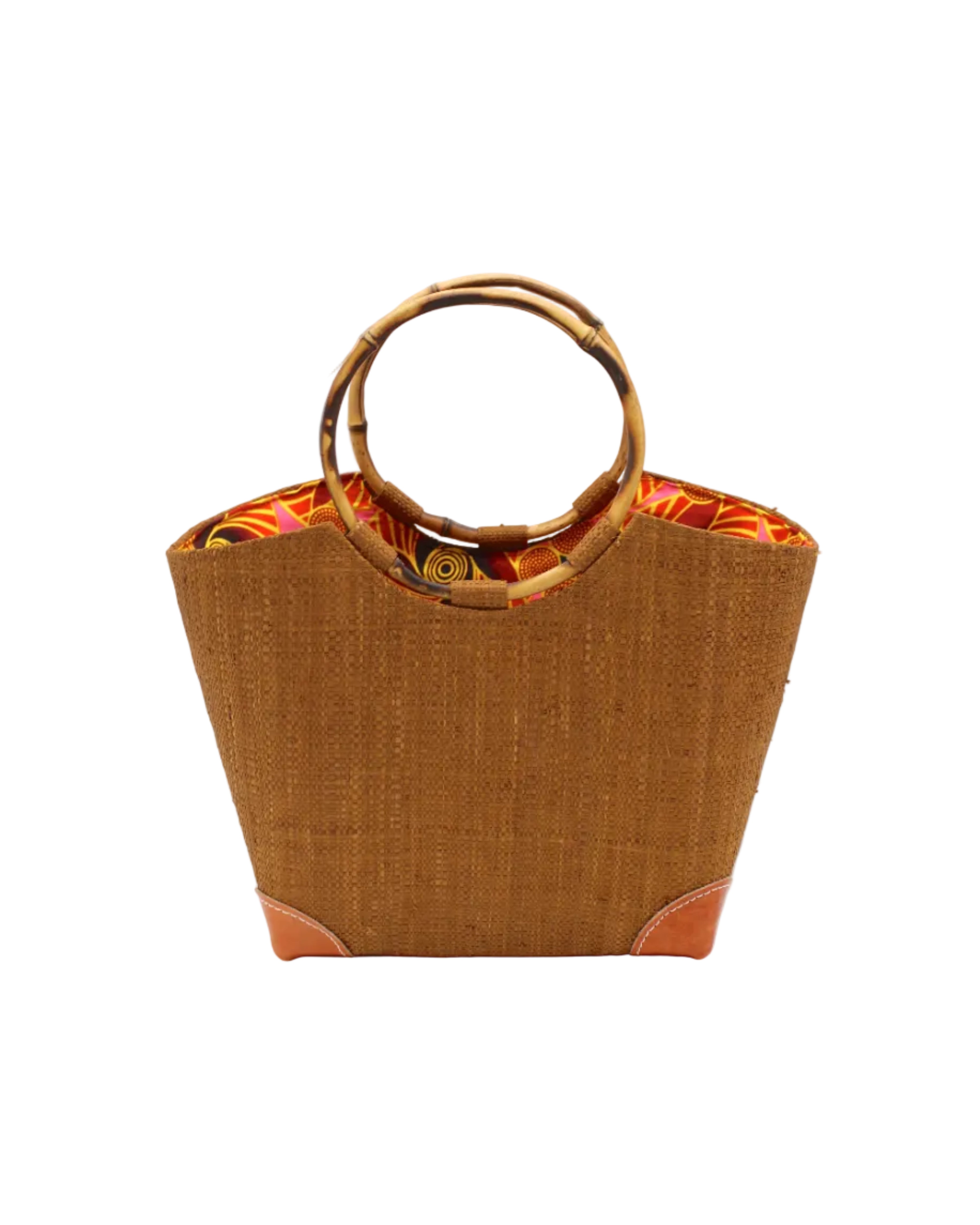 Betty Straw Bucket Bag with Bamboo Handles handmade loomed natural raffia palm fiber in a solid hue of tobacco cinnamon/dark/brown with circular bamboo handles, leather feet, and colorful African Print wax cloth liner handbag purse tote - Shebobo